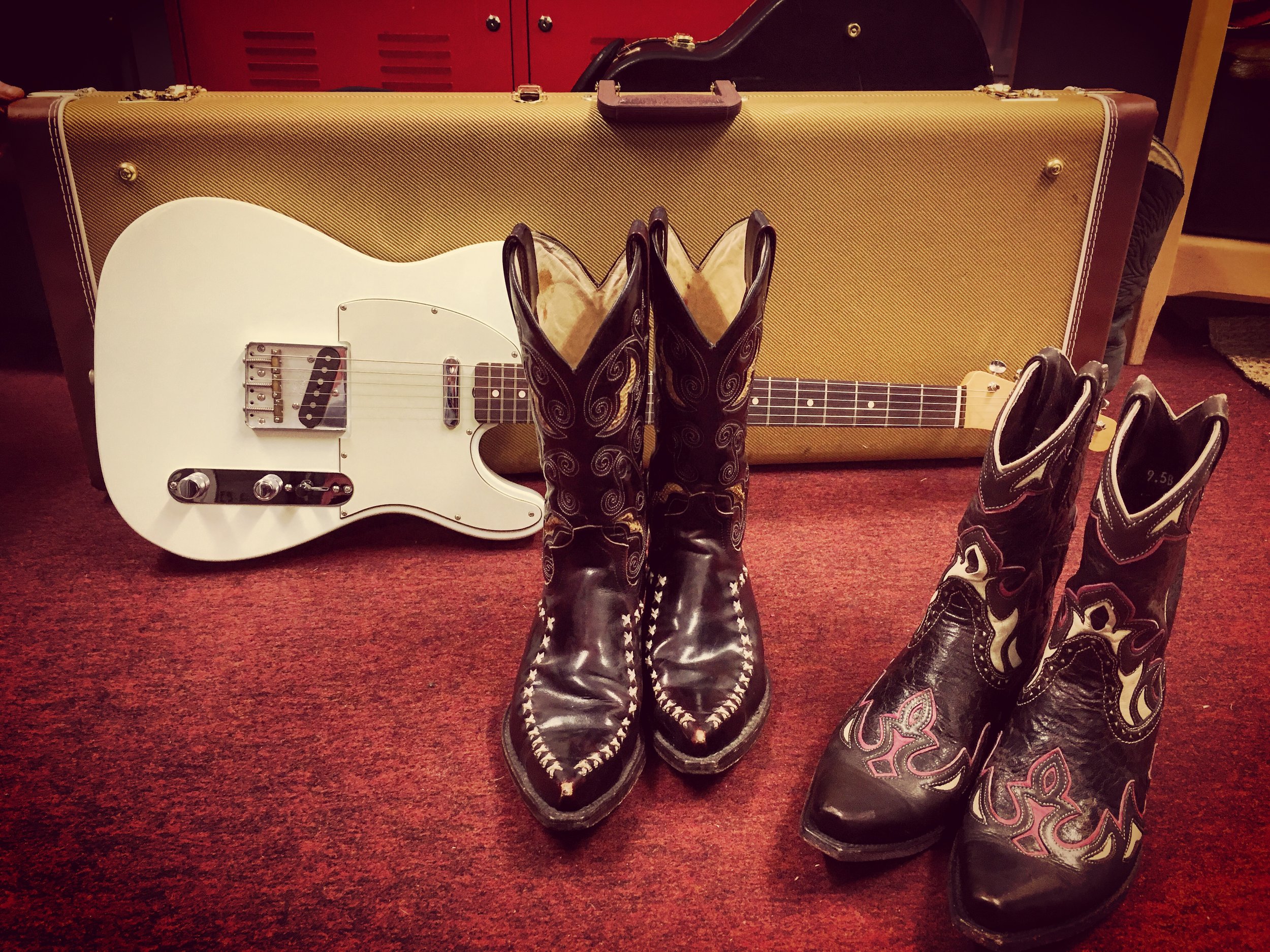cowboy boots and a guitar