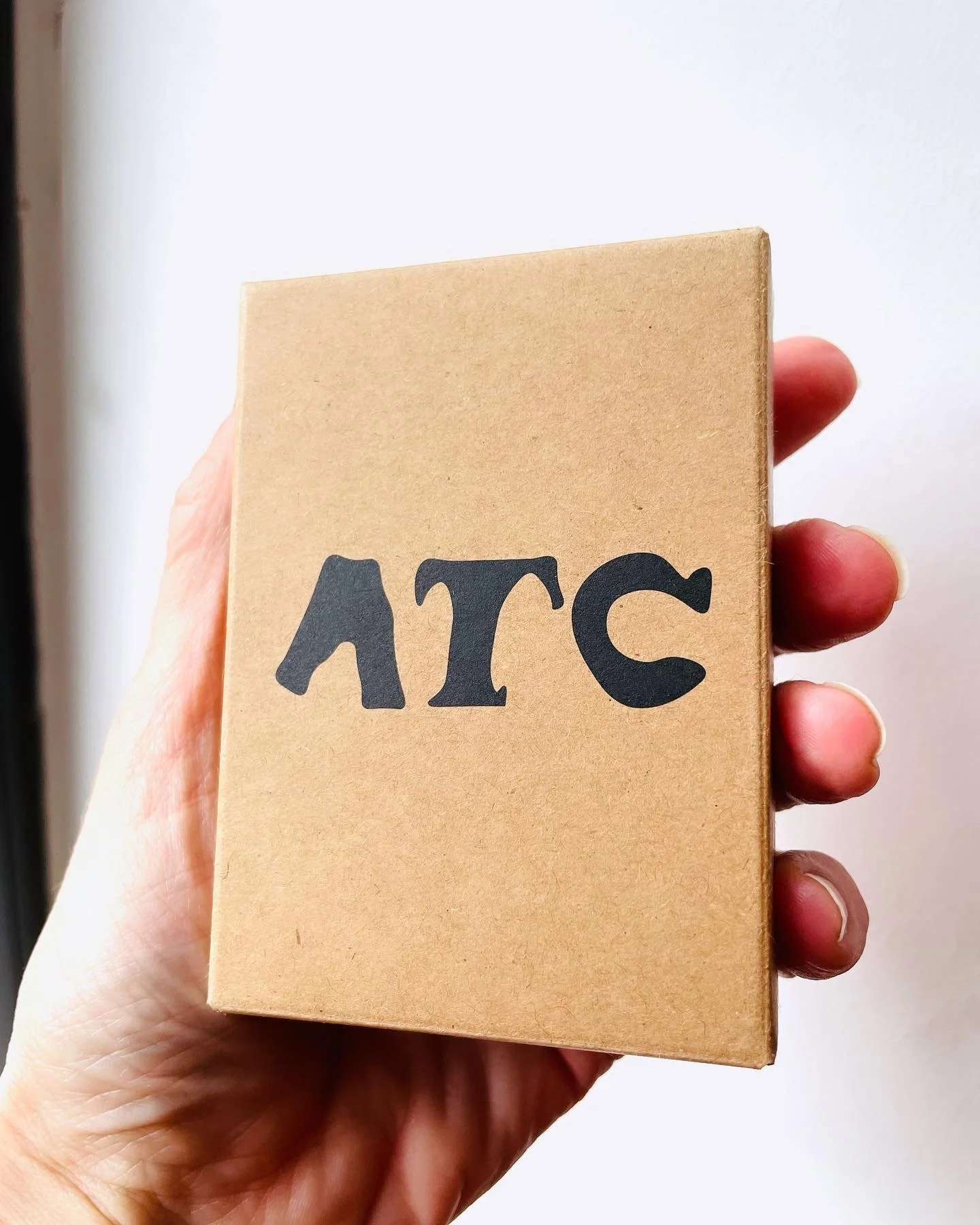 holding ATC box.JPG