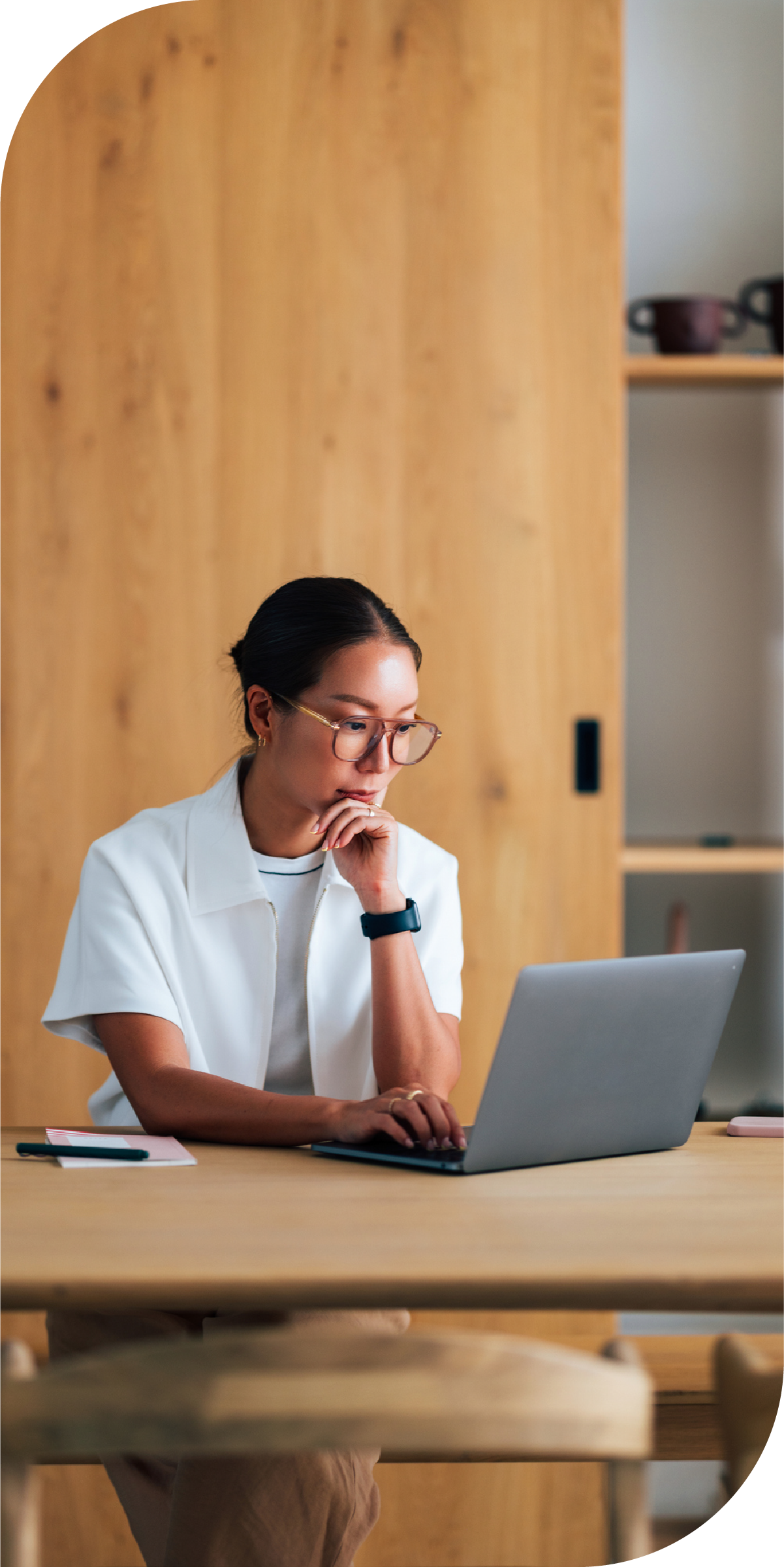 Woman on laptop in office