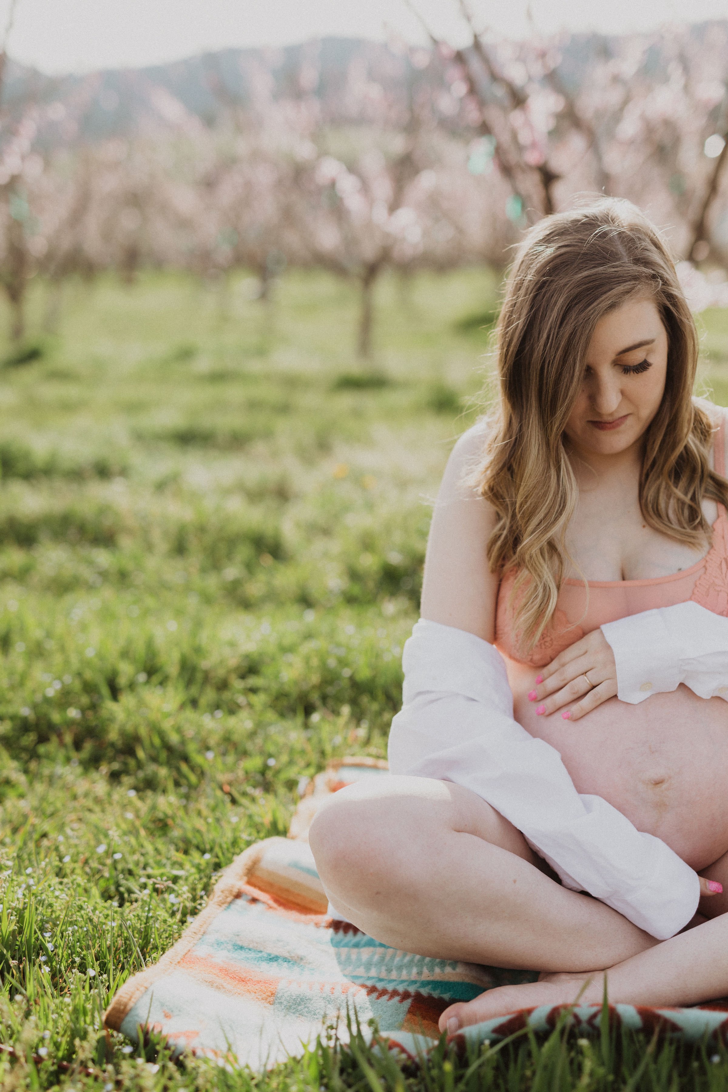 Oregon pear orchard spring blossom intimate maternity session