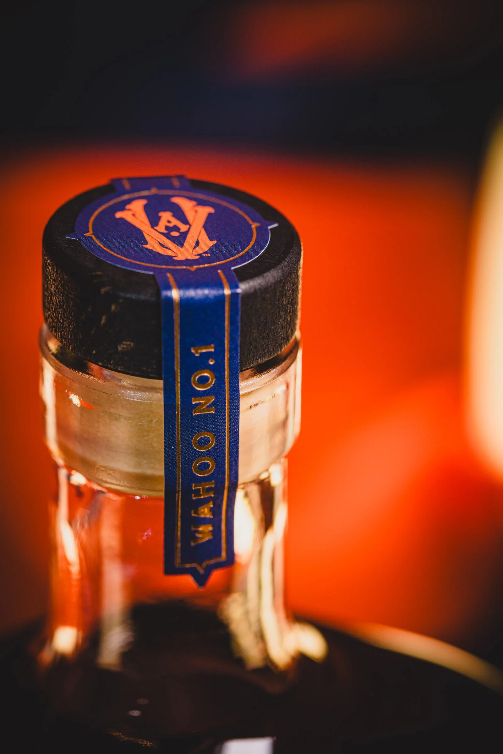 A close-up of the UVA Logo and Bottle Top for the High n' Wicked Wahoo No. 1 Single Barrel Kentucky Straight Bourbon Whiskey bottle, 6 Year Old, UVA Collaboration.
