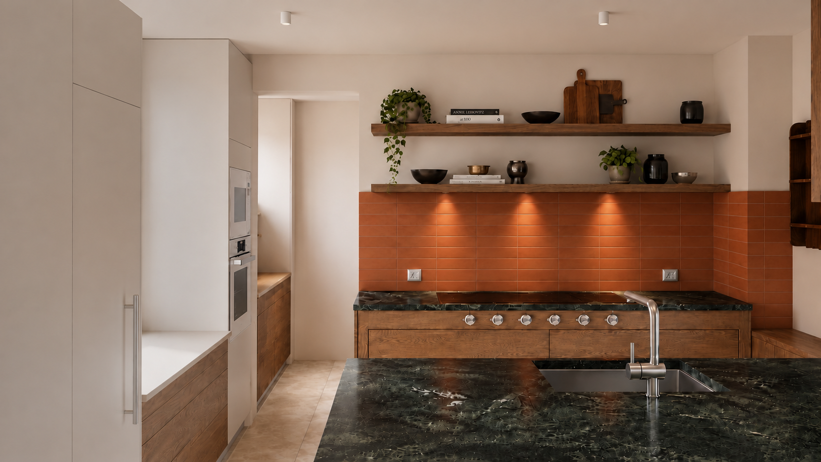 Wallisellen villa kitchen concept with a dark green stone island, timber cabinetry and warm task lighting.