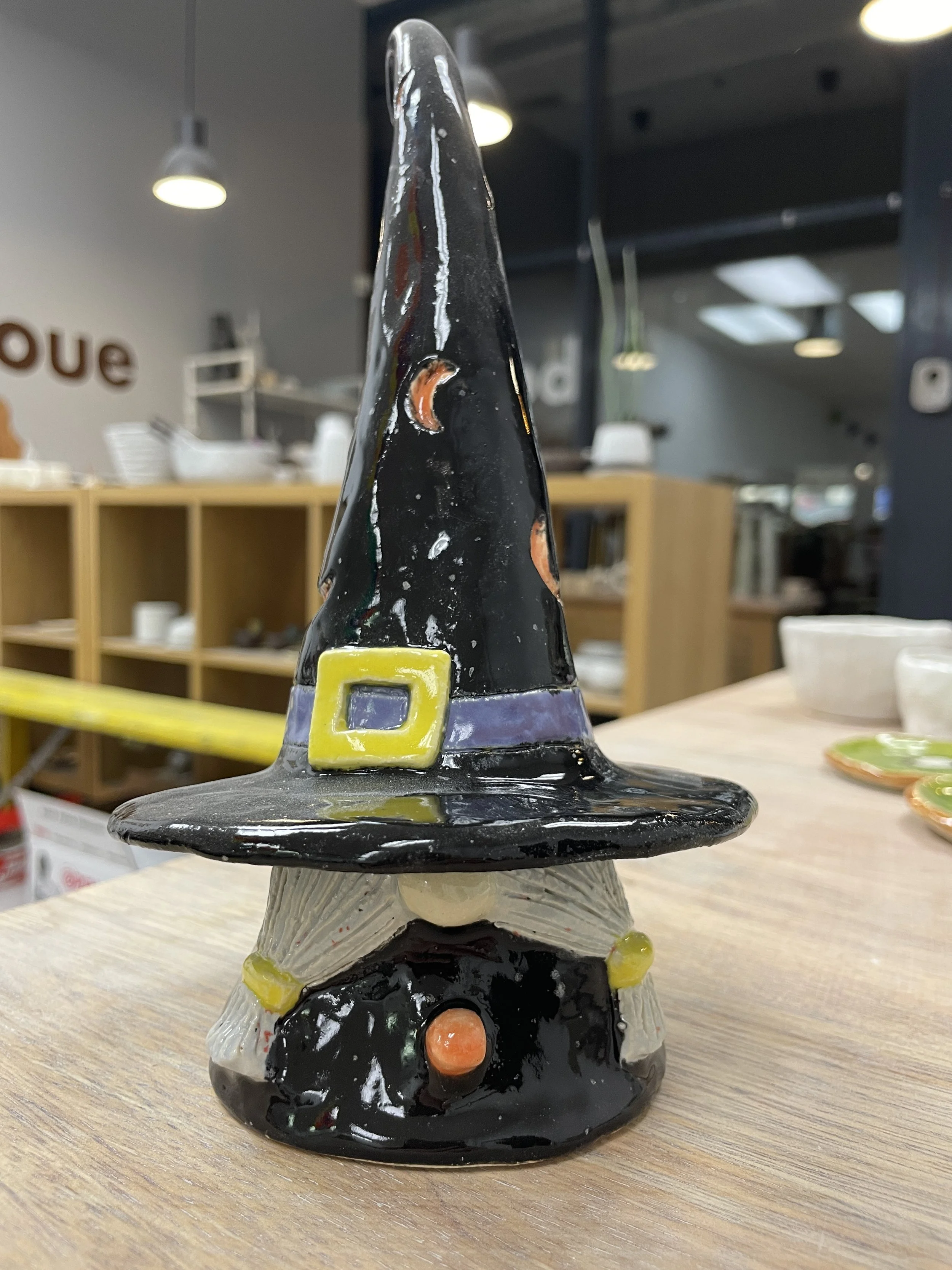Ceramic figurine of a witch's hat with beard