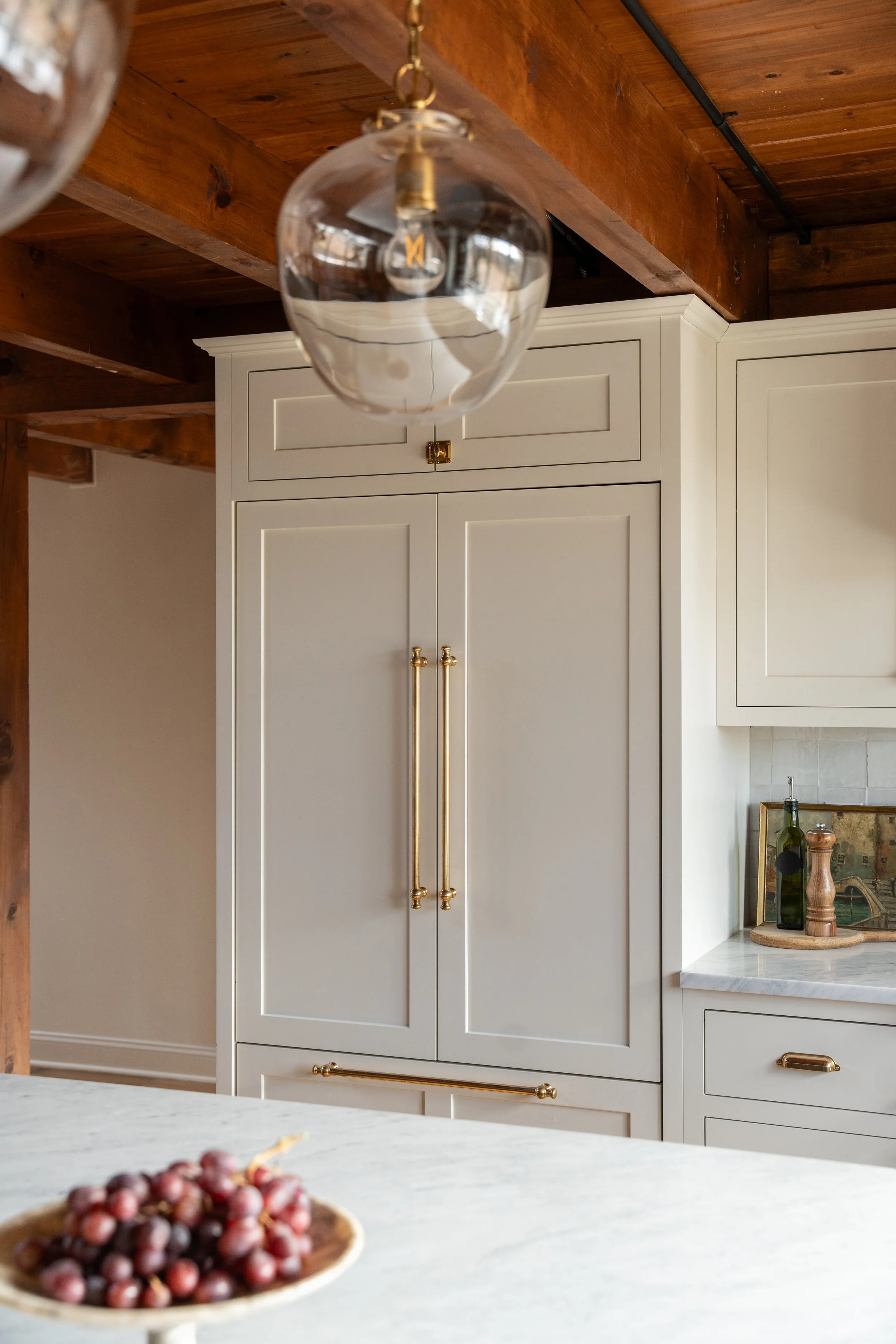 Kitchen fridge panel, supplied and installed by Cora Cabinetry a New Jersey based cabinetry shop.