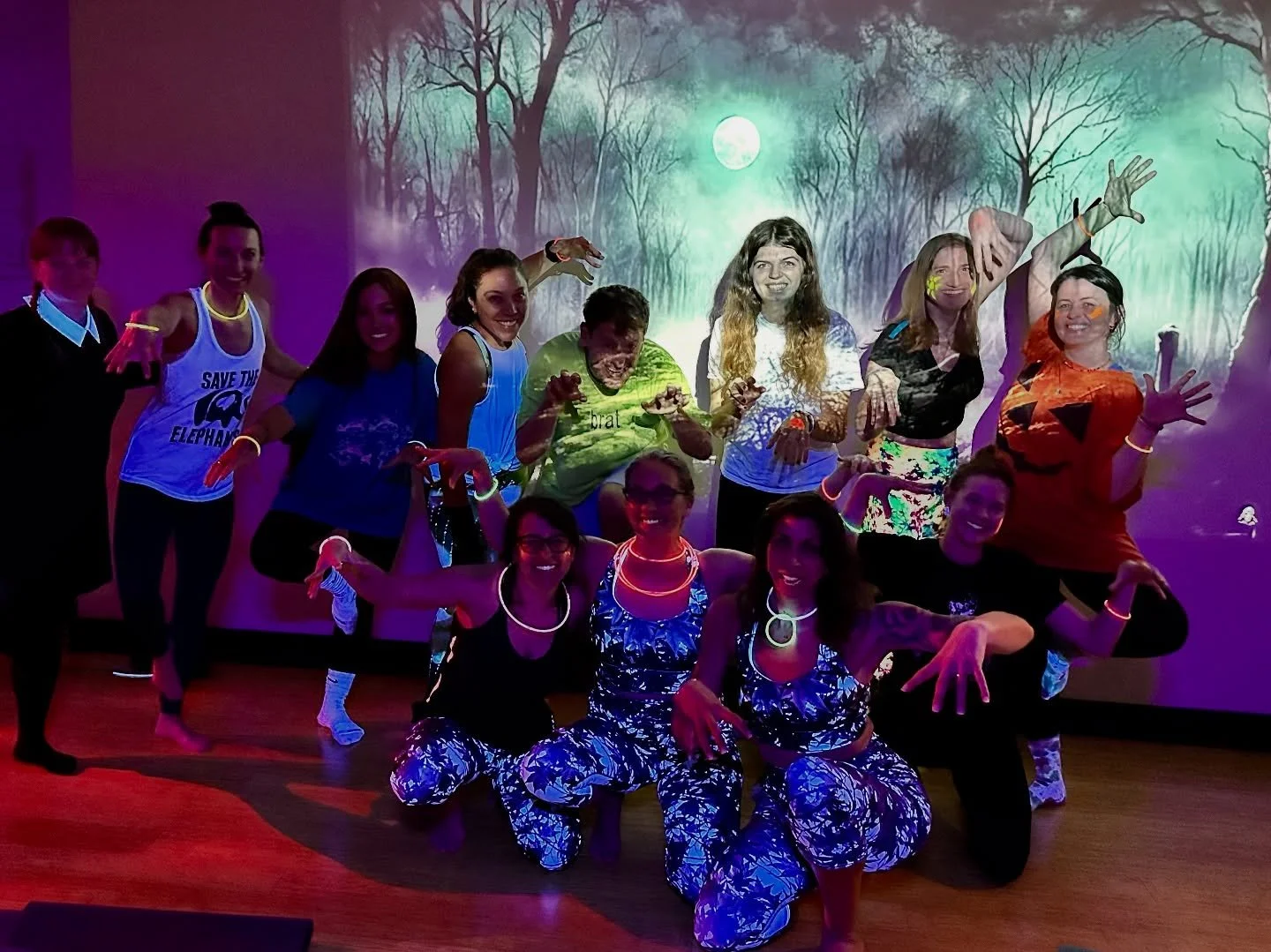 More GLOWGA fun from last night!! 🎃👻💀😳✨🪾
And the winner of Best Costume is&hellip;Wednesday!! 🏆
Happy Halloween all!!! 

#yogalab #downtownstatecollege #statecollege #happyvalley #glowga #halloweenyoga