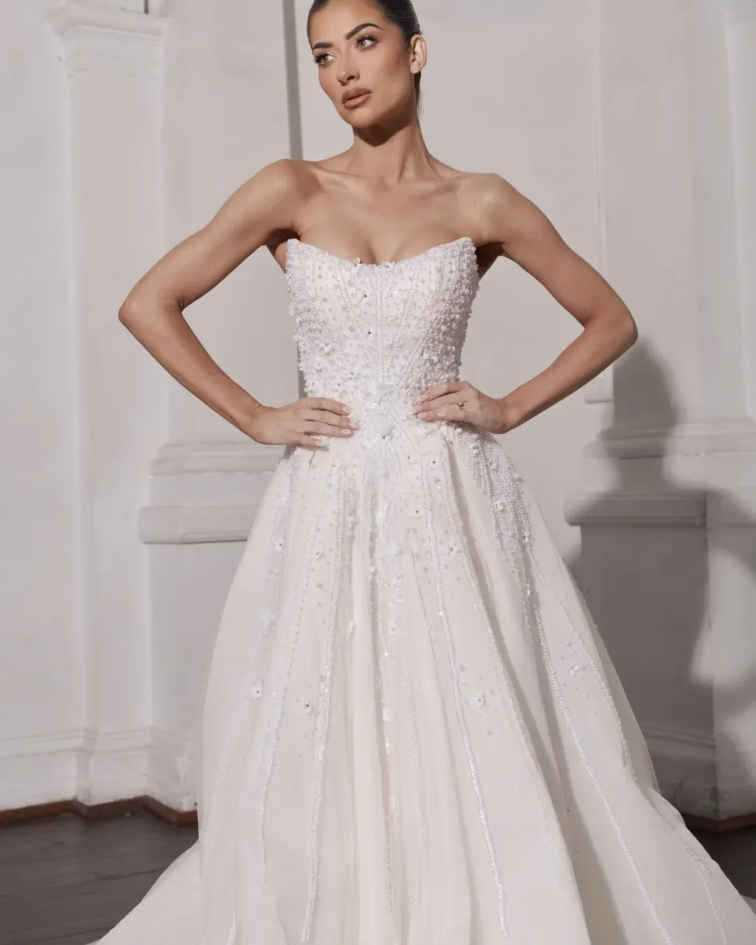 strapless beaded ball gown wedding dress from Cizzy Bridal.webp
