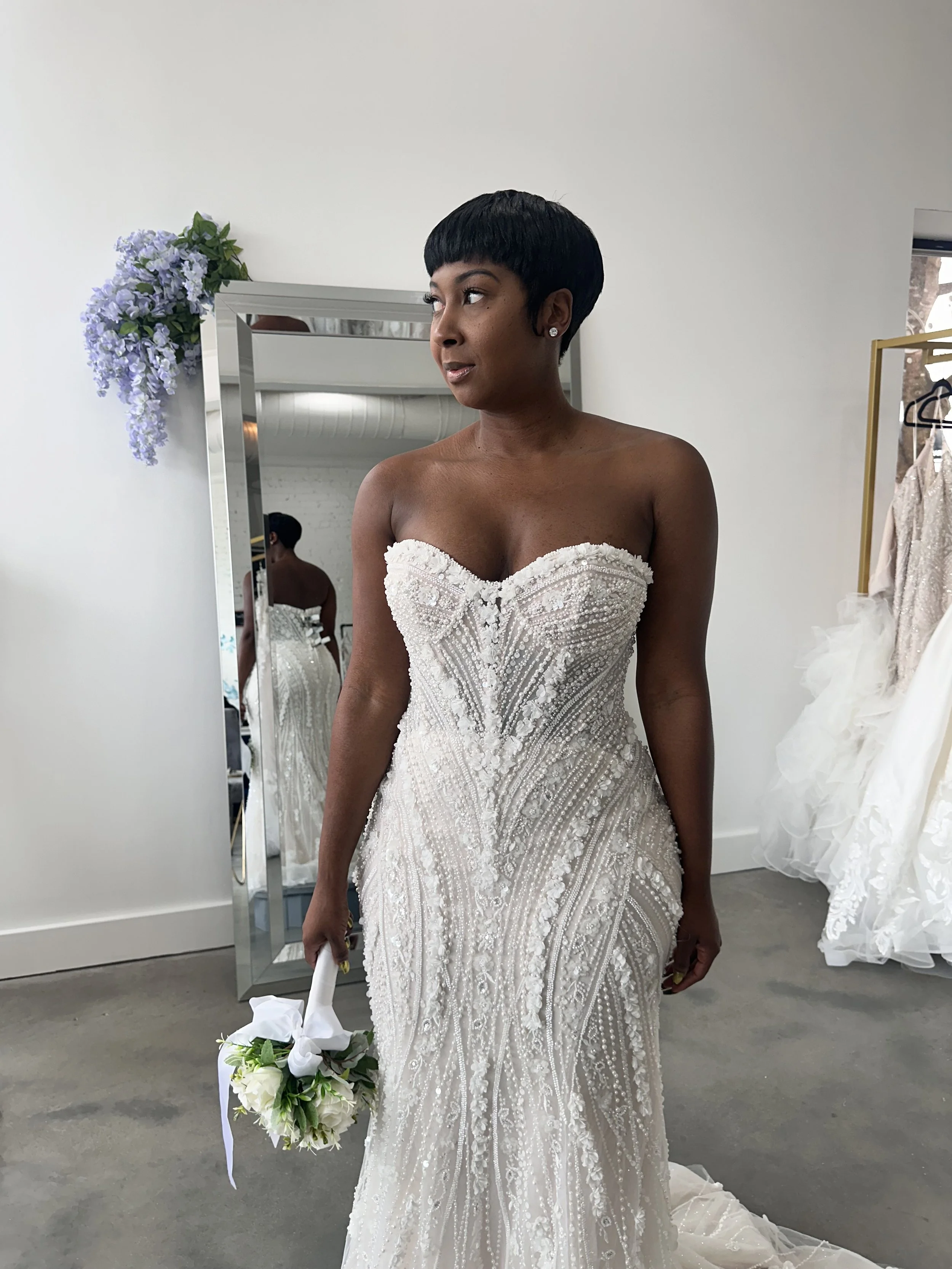 bride wearing a luxury wedding dress fully beaded