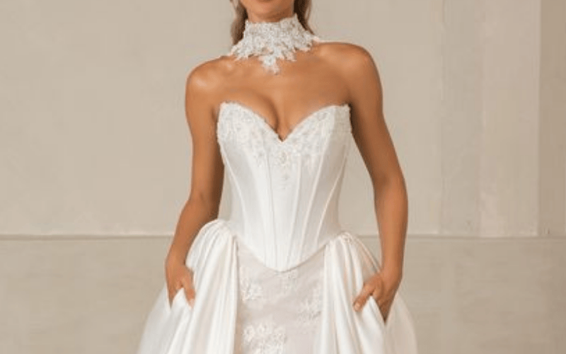Strapless corset bodice wedding dress with lace choker inspired by 2026 wedding dress trends.