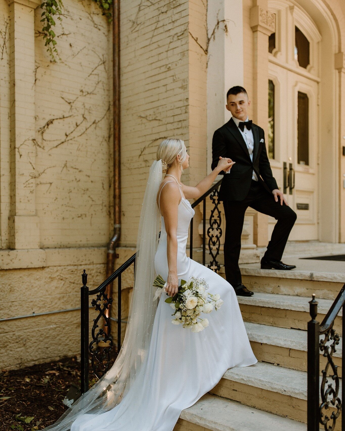 Only a few steps up before you're inside our elegant, historic mansion rooted in downtown Milwaukee's East Side neighborhood. Step inside and you'll see our ballroom, parlors, and so much more!

Photo by Kaleigh Rae Photography