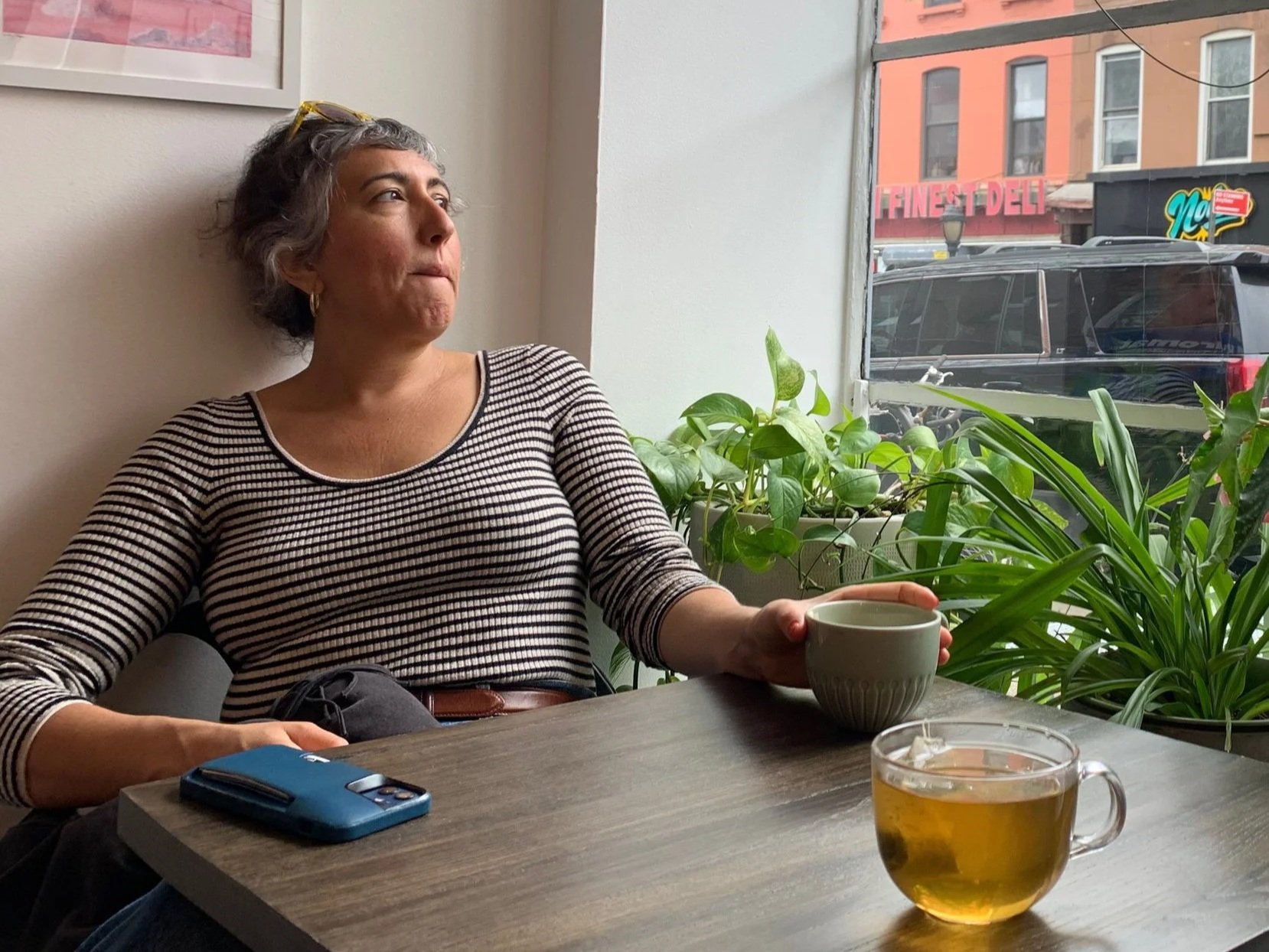 Kim+with+coffee+and+teal.jpg