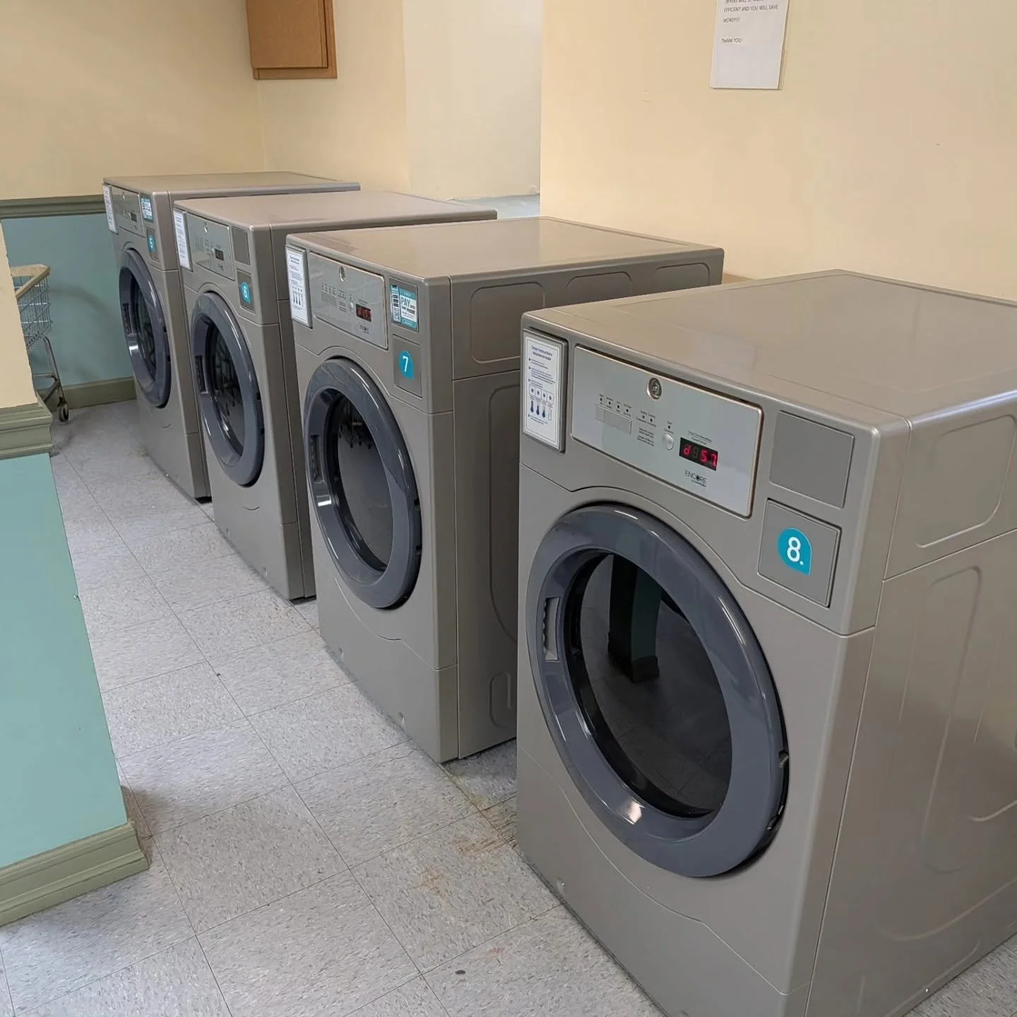 Commercial washers in a laundry room