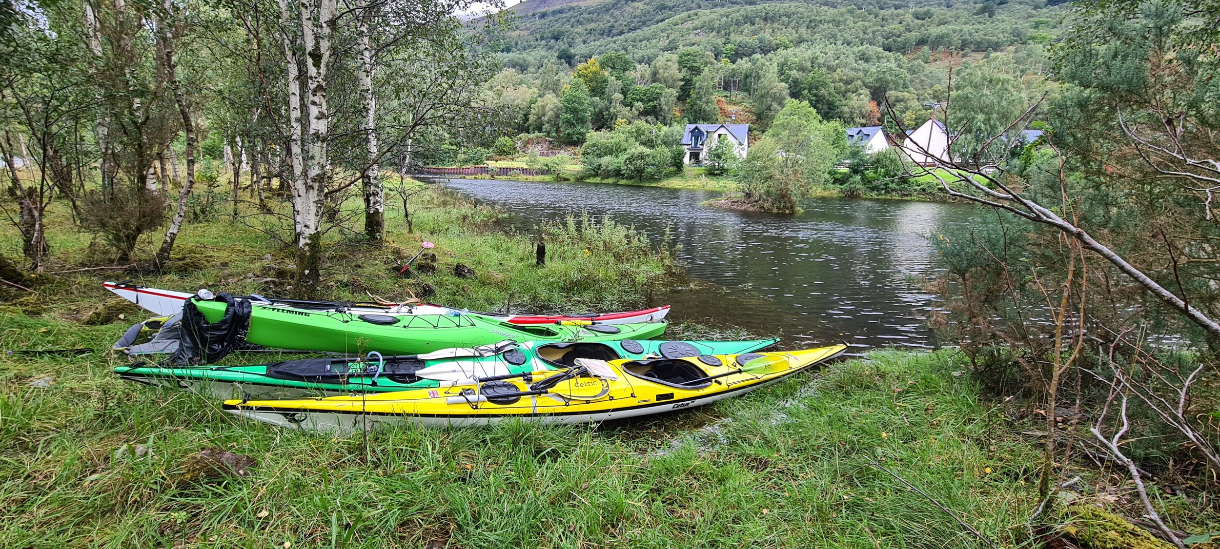 Sea kayaks on a trip.jpg