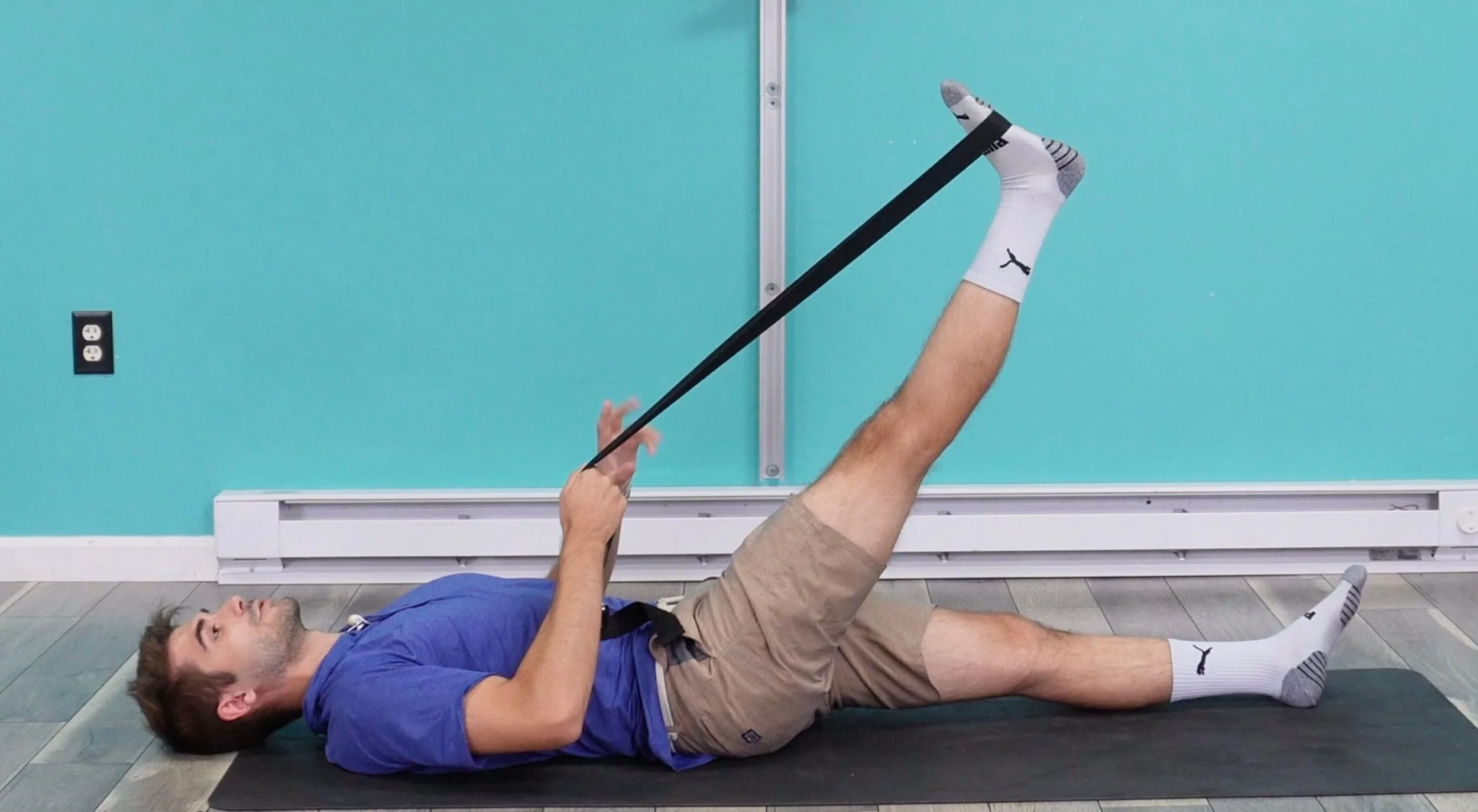Active patient receiving hands-on therapy after weight training