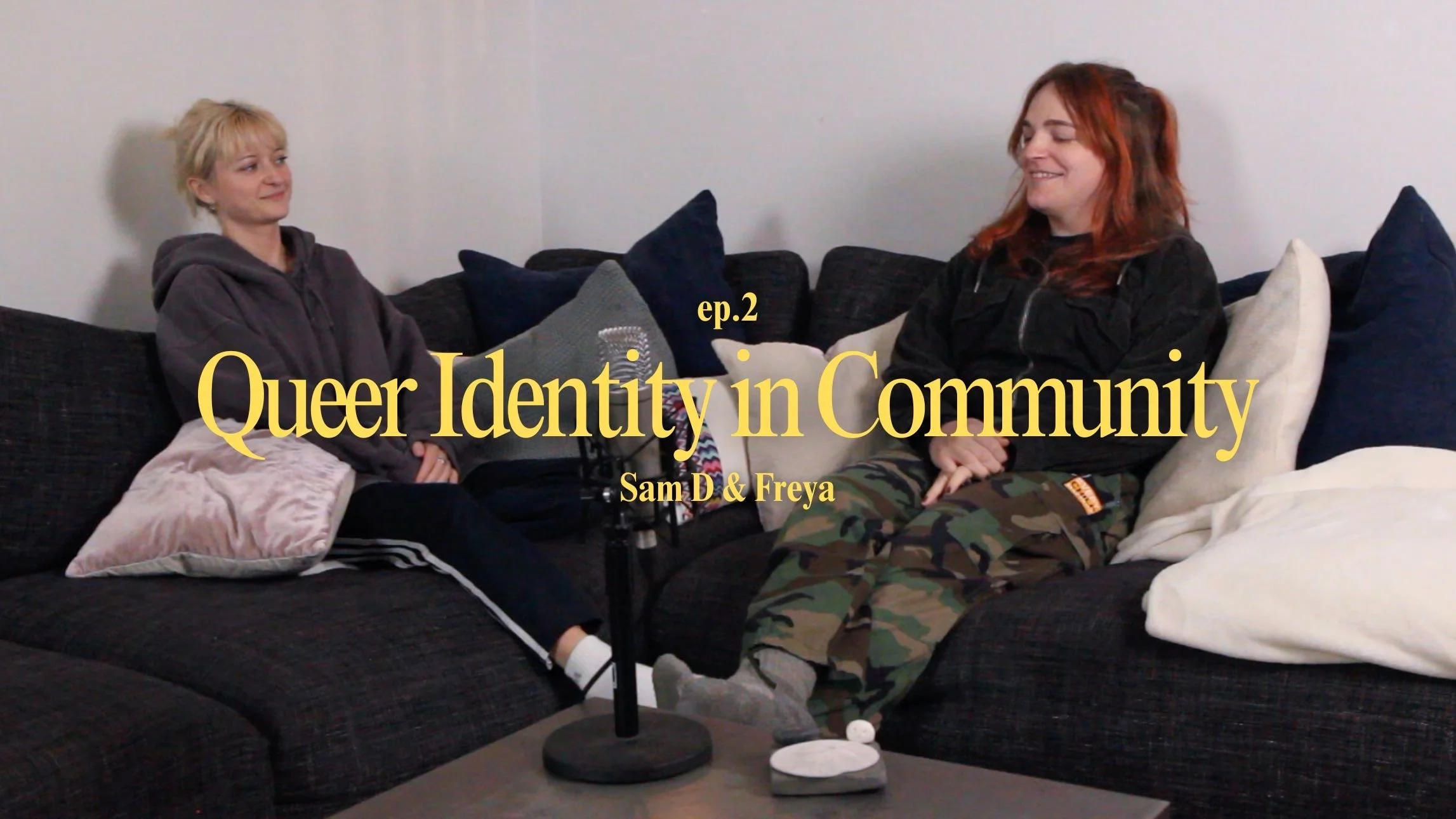 Sam D. and Freya sitting on a couch. The title 'Queer Identity in Community'.