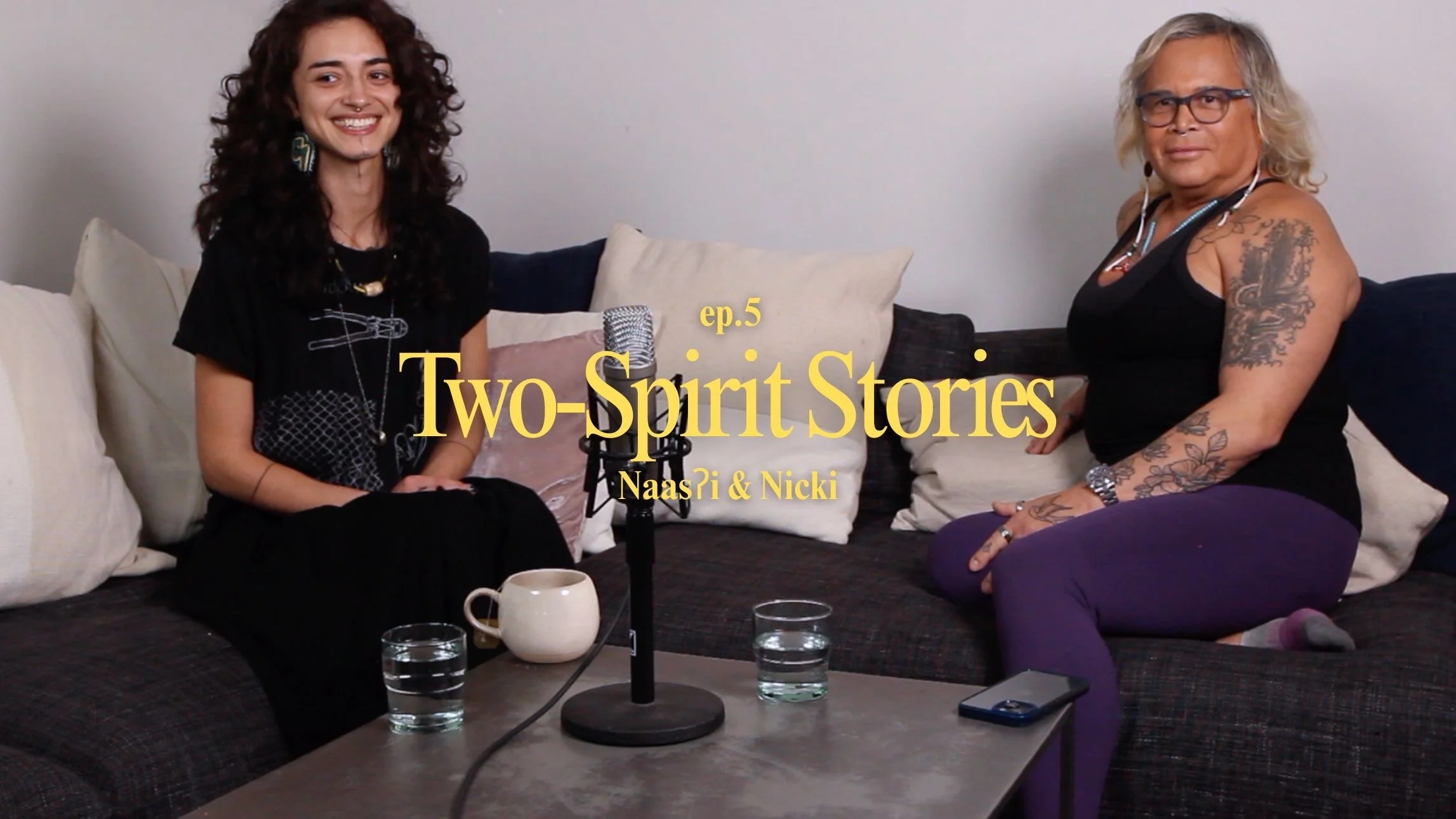 Naas & Nicki sitting on a couch. The title 'Two-Spirit Stories'.