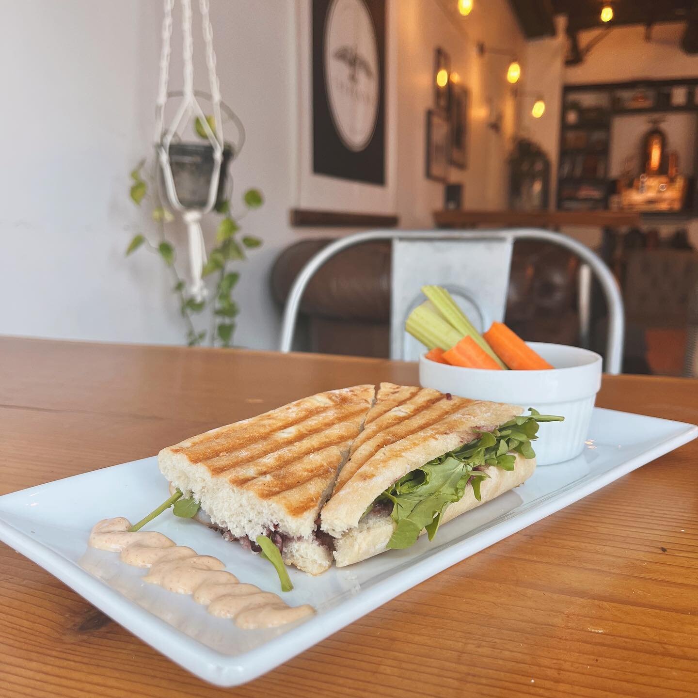 New paninis! We just refreshed our menu and added three new delectable paninis! 🍽️ 

Turkey Cran (pictured): tart cranberry layered with turkey, havarti and arugula. 

Tuna Melt: a flavourful homemade tuna salad topped with arugula, house pickled on