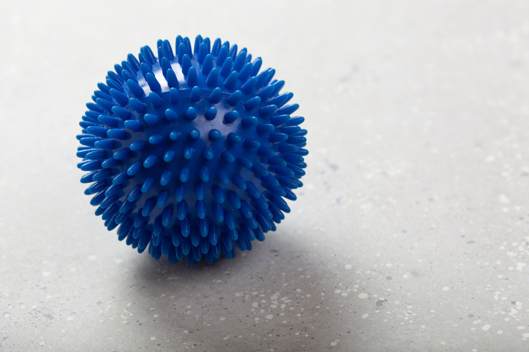 A blue spiky sensory ball