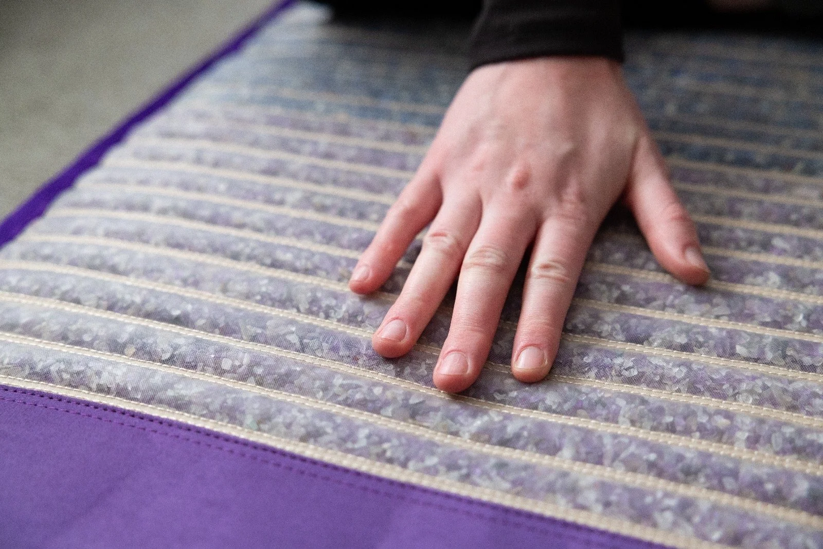 Align mat with hand on it
