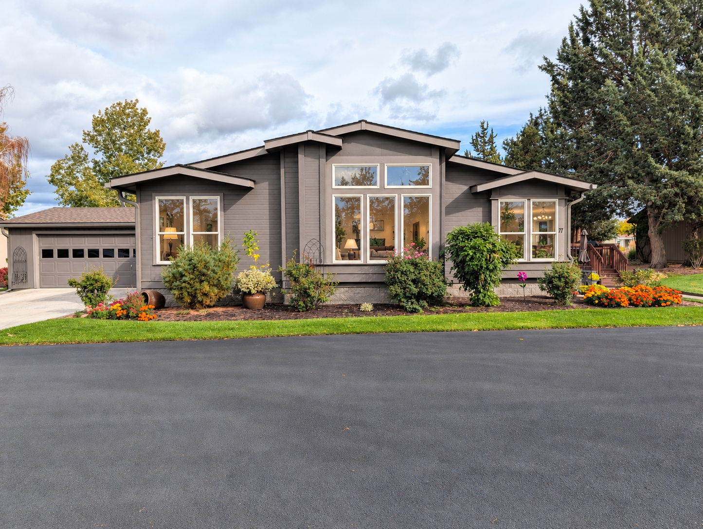 Suburban Home with Warm Window Glow.png
