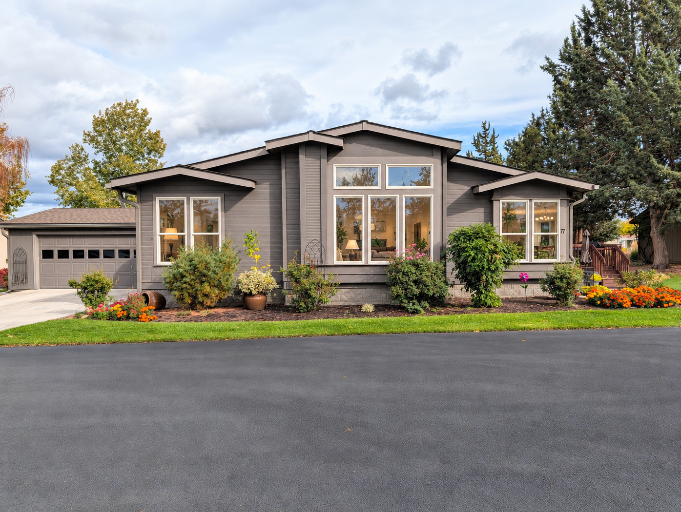 Suburban Home with Warm Window Glow.png