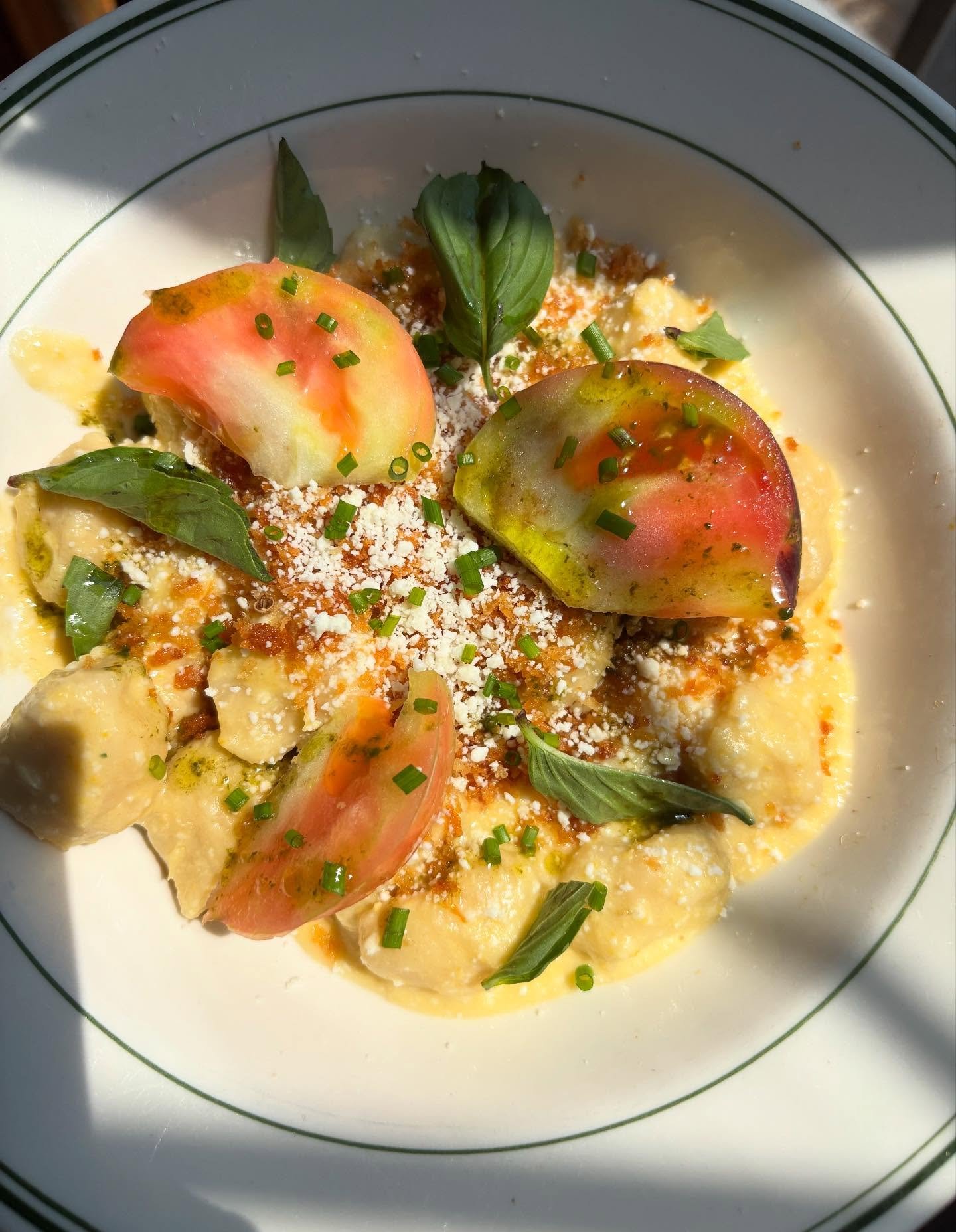 Ricotta gnocchi, sweet corn cream sauce, Cotija, breadcrumbs, Thai basil, chives, cilantro oil and some semi green heirlooms. Was a perfect breakfast.