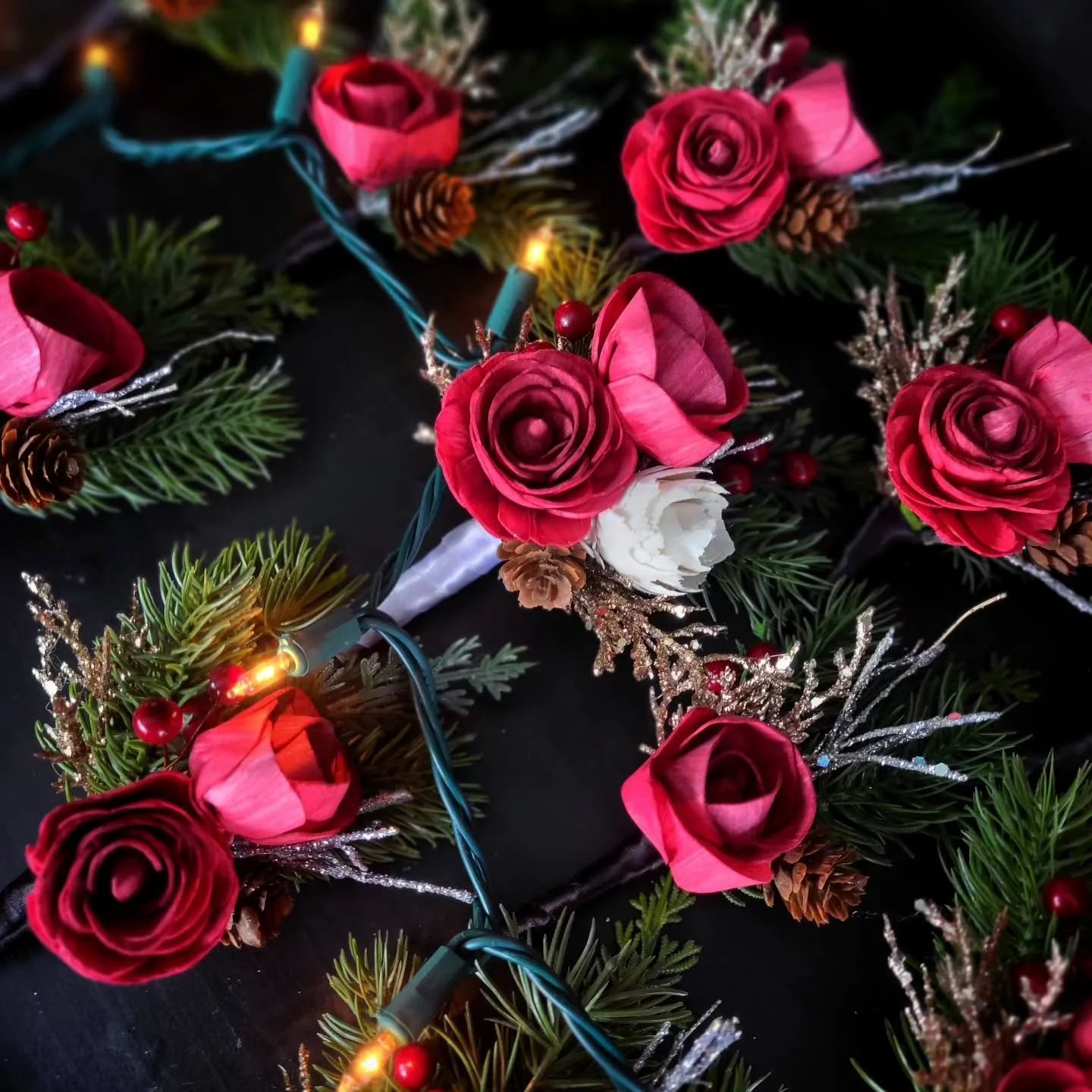 The florals for Abi and Eric's classic Christmas wedding are one of my favorite projects to date. I especially loved these boutonnieres, with their carefully painted roses, realistic artificial pine, and festive accents. Happy wedding day, Abi and Er