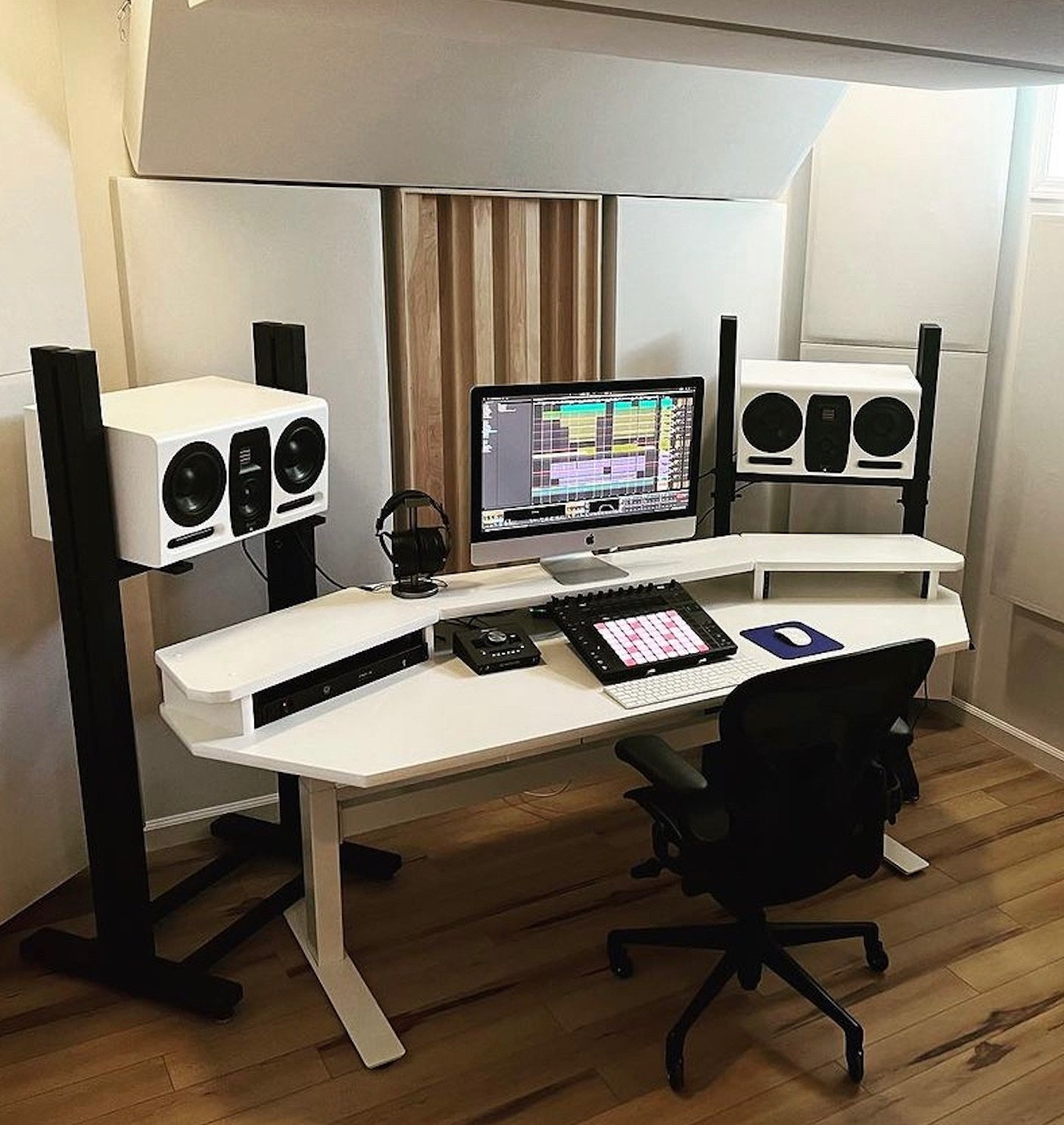 Many people set their studio monitors on a desk.

However, desk placement introduces reflections, vibration, and low-end buildup that can throw off your entire mix. Stands eliminate those variables and give you a clearer, more honest listening experi