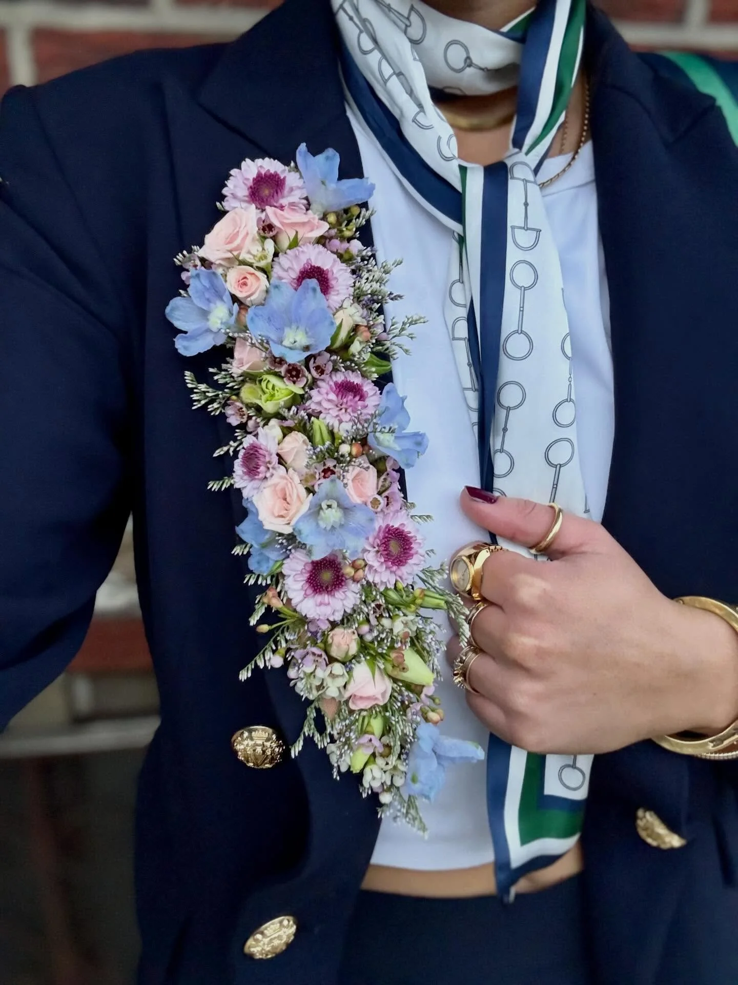 Looking for something that isn&rsquo;t a bouquet, boutonniere, or any other traditional floral piece?

Our flower tattoos are a unique, wearable option-  applied directly to the skin or styled on a lapel, like shown here. They&rsquo;re fully customiz