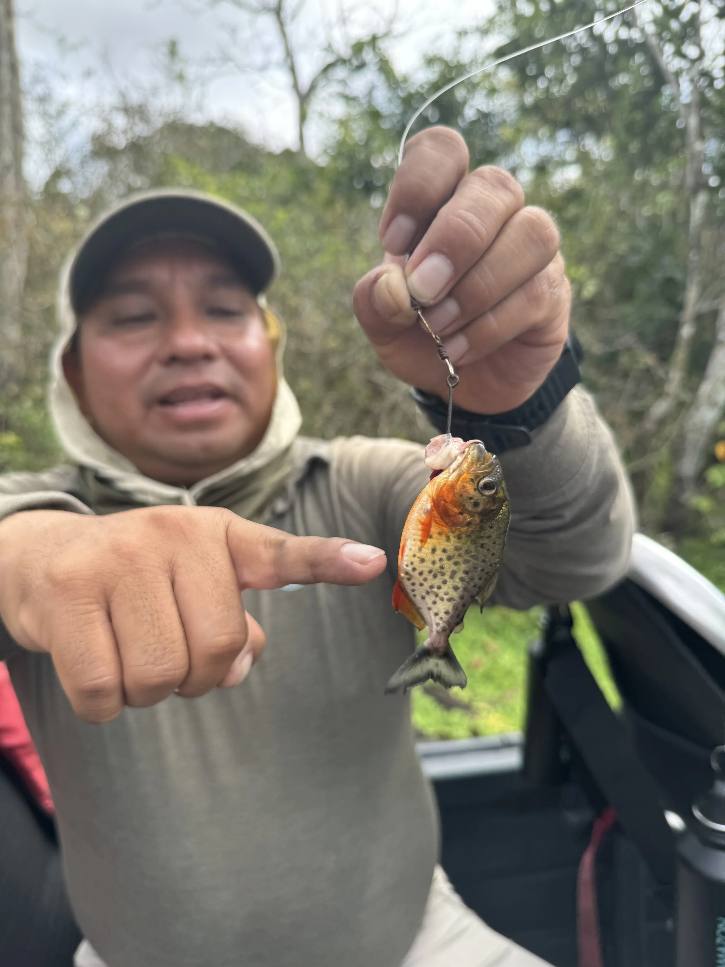 Expedition Guide with a piranha
