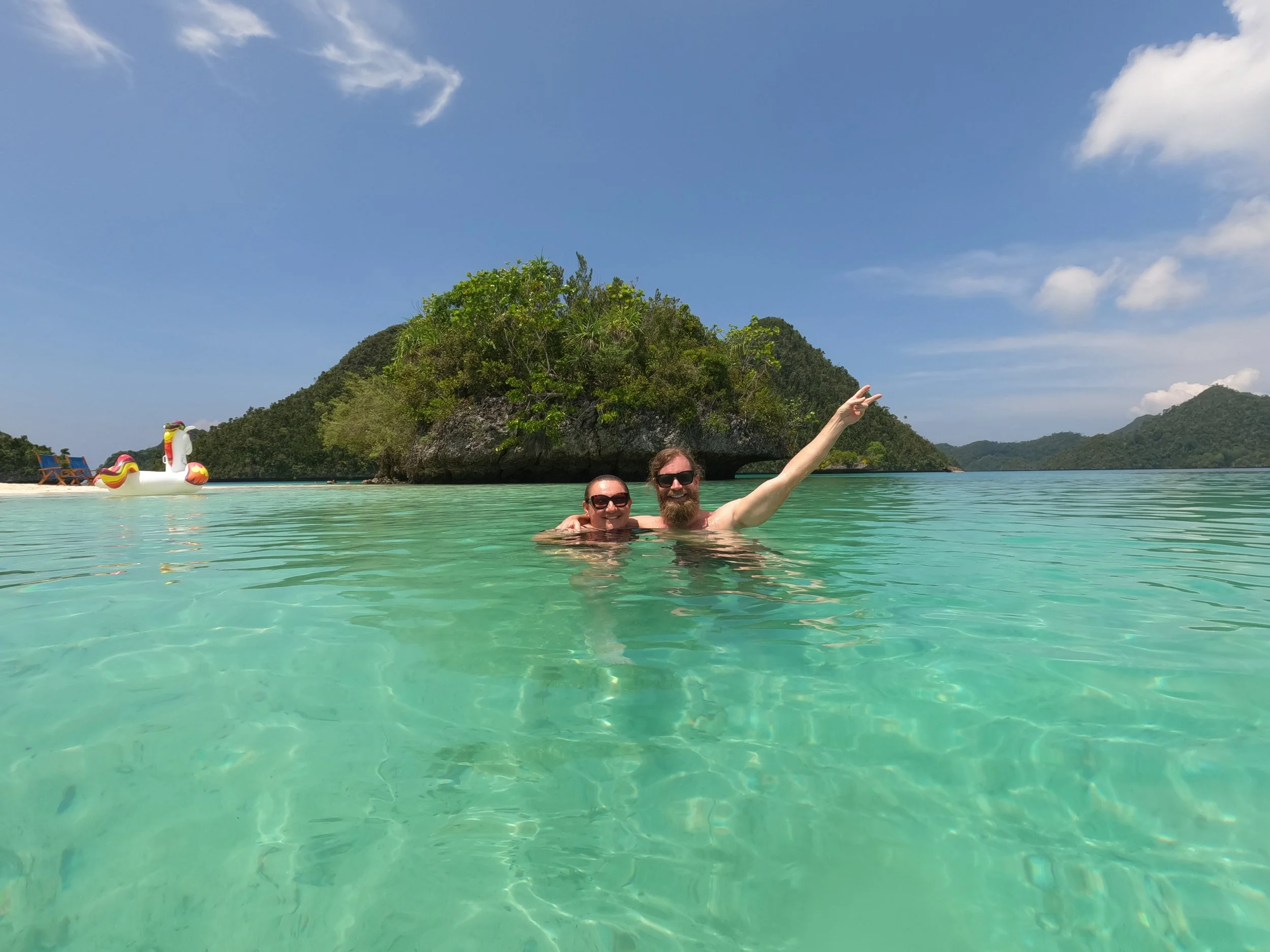 Enjoying a swim in the beautiful clear waters of Raja Ampat