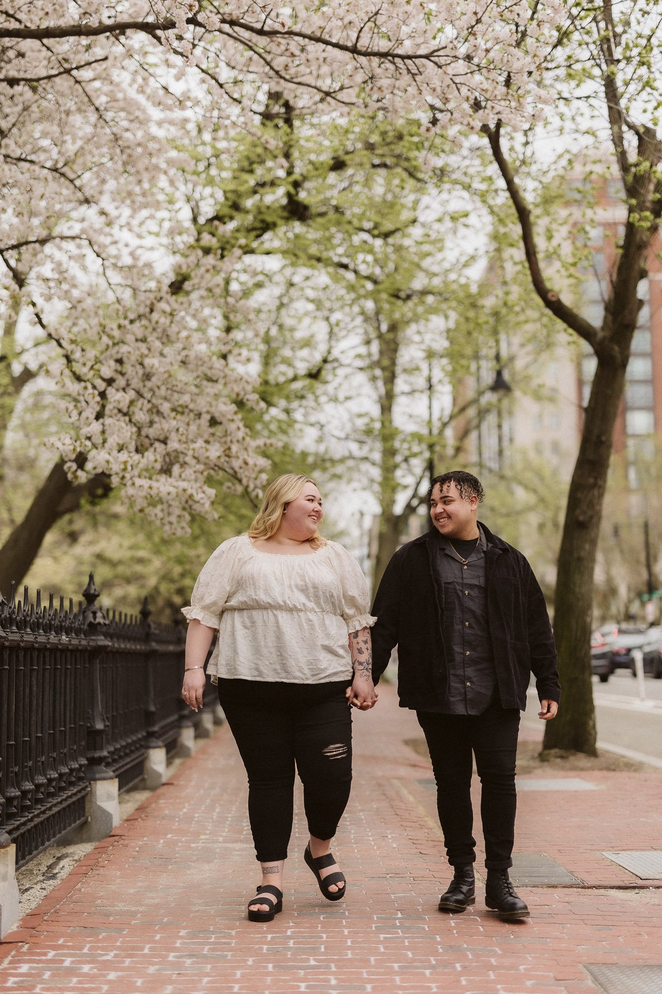 couple-walking-holding-hands-down-spring-street-couples-photographer-pheonix-boston.jpg