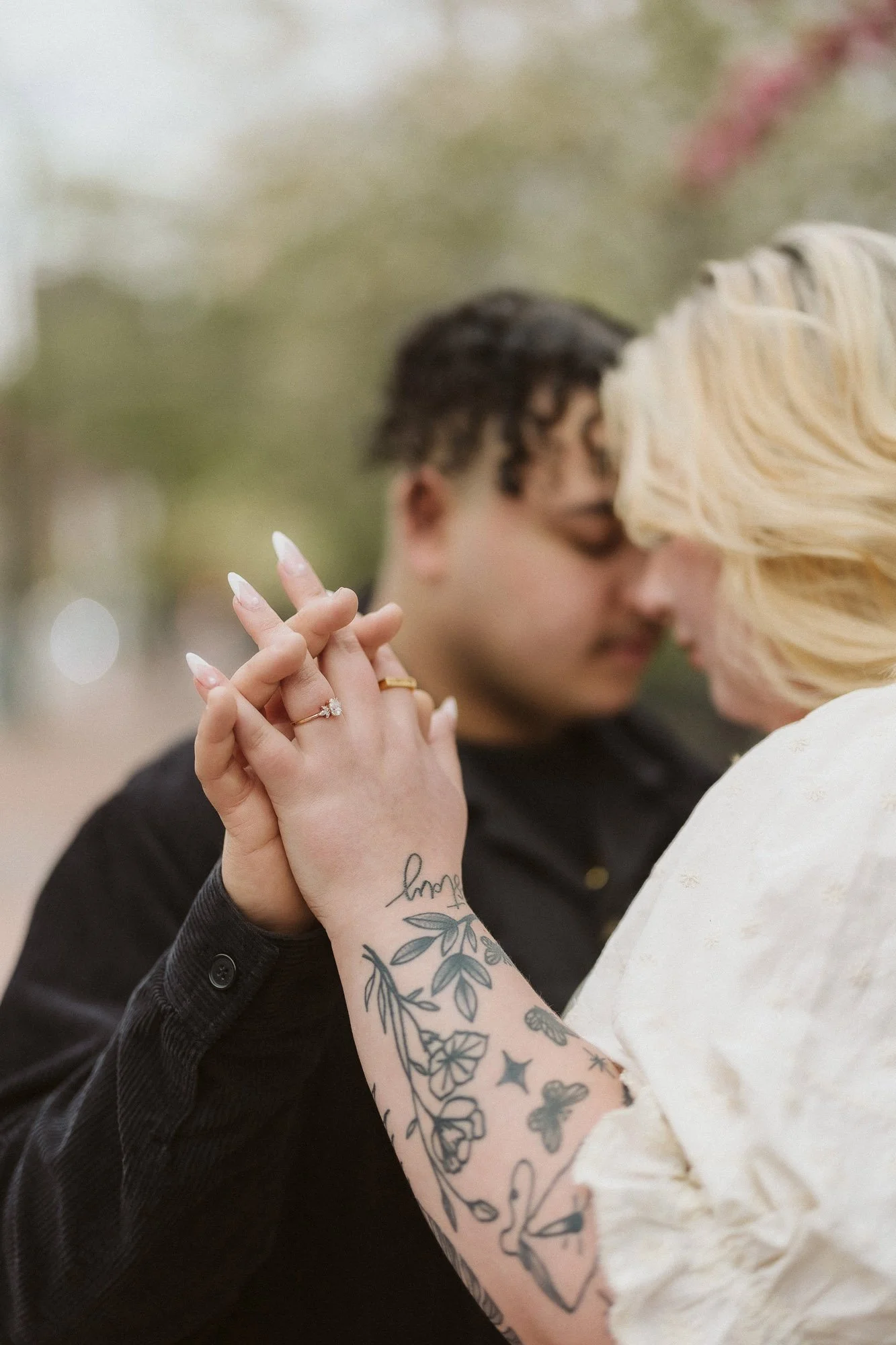 close-up-couple-hands-held-in-air-couples-photographer-autumn-skye.jpg