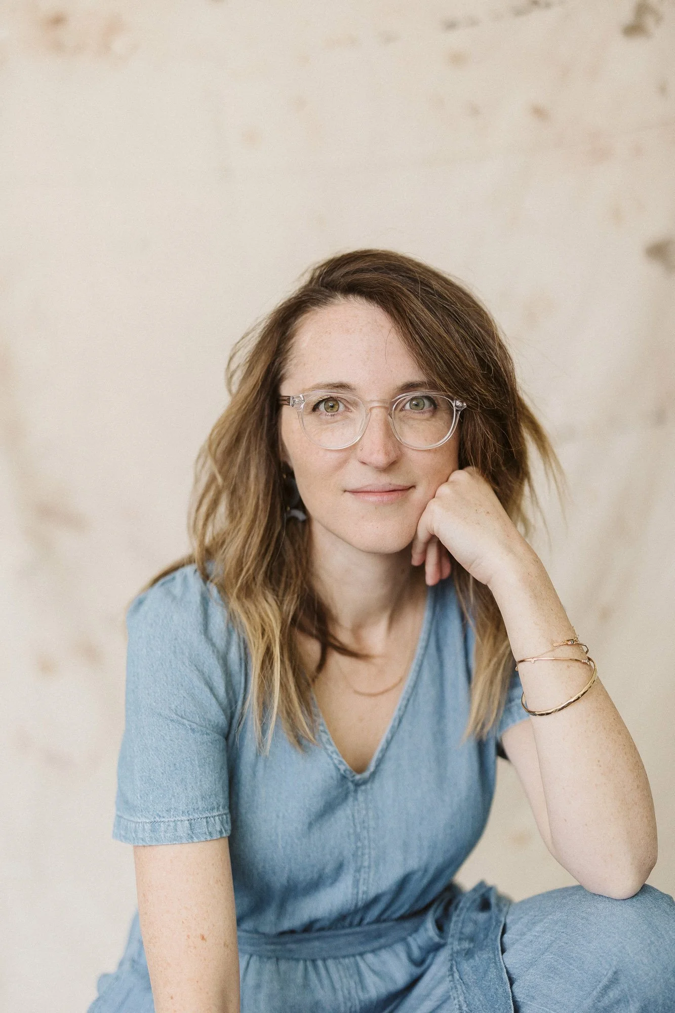 portrait-of-brunette-woman-with-glasses-staring-at-camera-branding-photographer.jpg