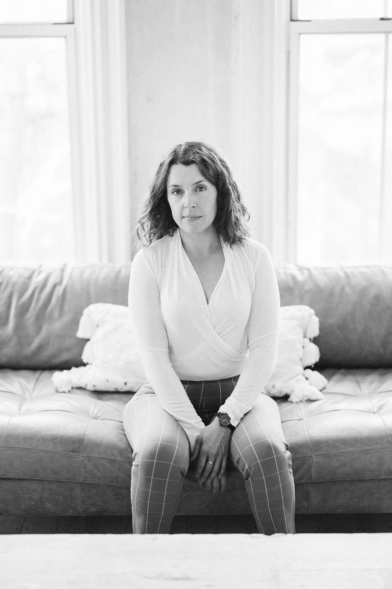 woman-straight-on-sat-on-couch-monochrome-branding-photographer-autumn-skye.jpg