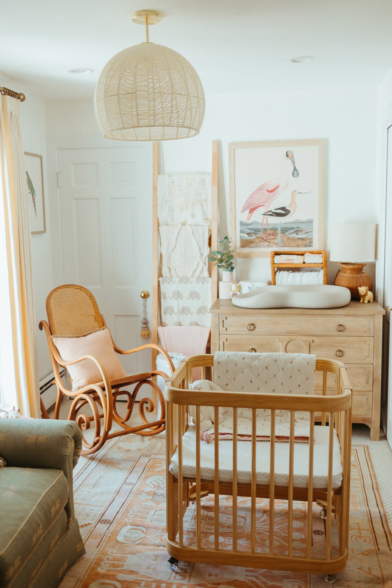 baby-nursey-wooden-rocking-chair-crib-green-couch-family-photographer-autumn-skye.jpg