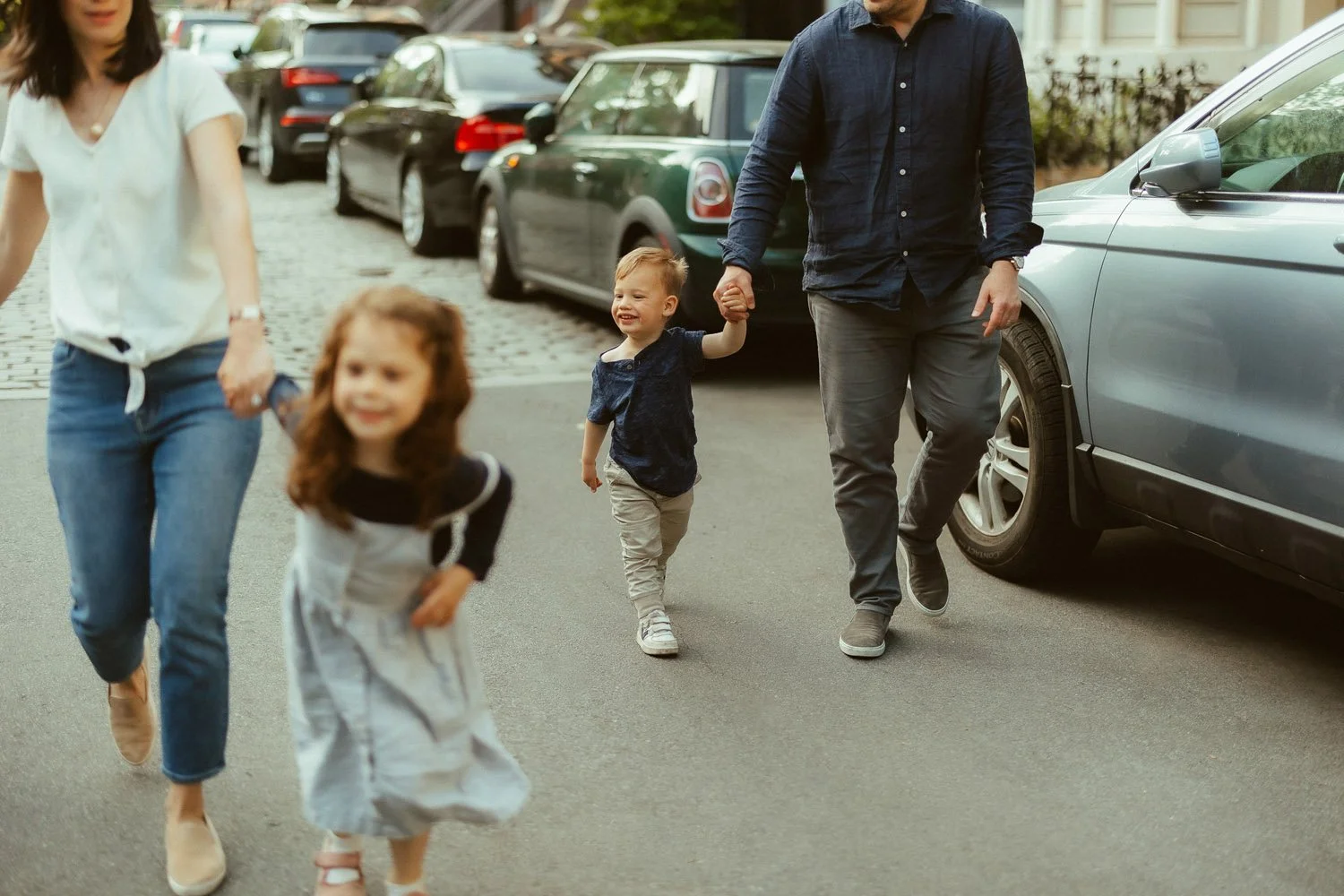 couple-crossing-road-with-smiling-children-family-photographer-autumn-skye.jpg