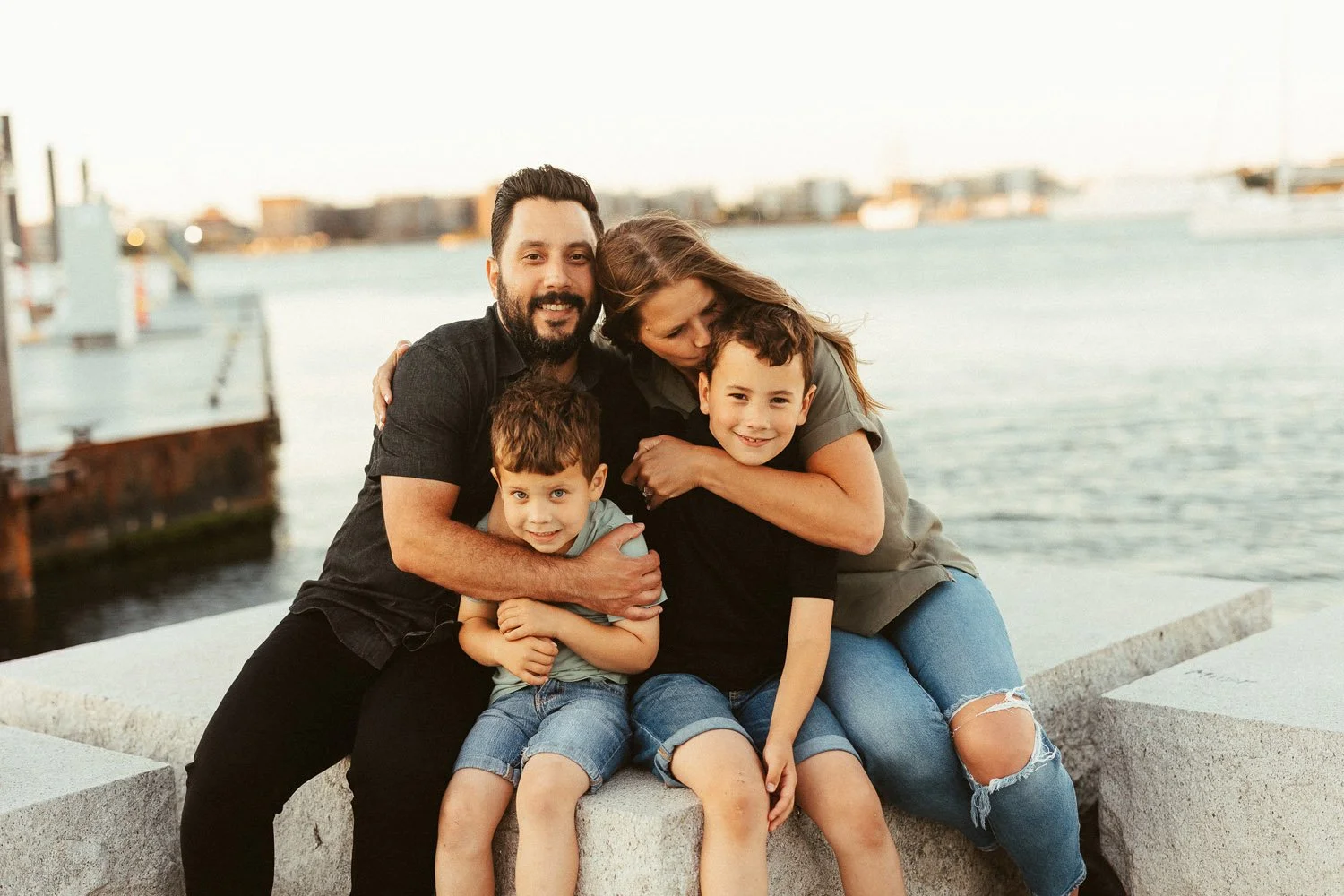 couple-two-sons-embracing-by-sea-sunset-family-photographer-autumn-skye-phoenix-boston.jpg
