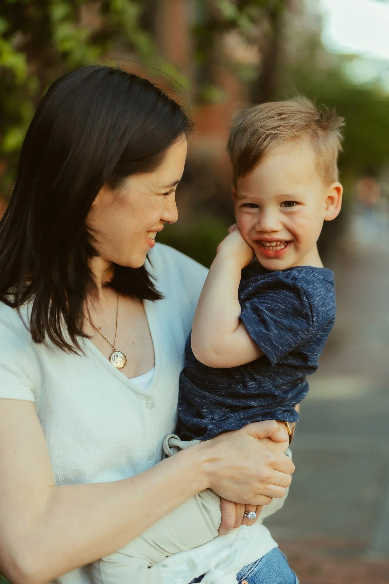 mom-gazing-at-toddler-son-in-arms-family-photographer-autumn-skye-phoenix-boston.jpg
