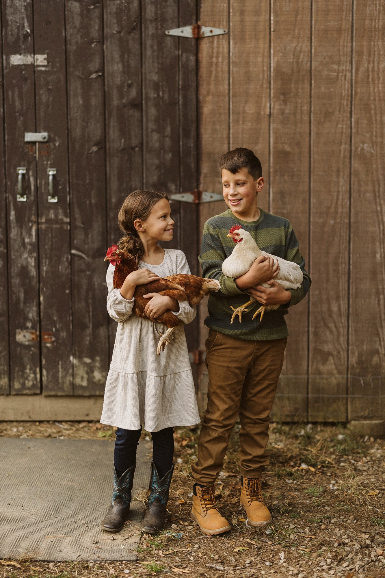 brother-sister-holding-chickens-family-photographer-autumn-skye-phoenix-boston.jpg