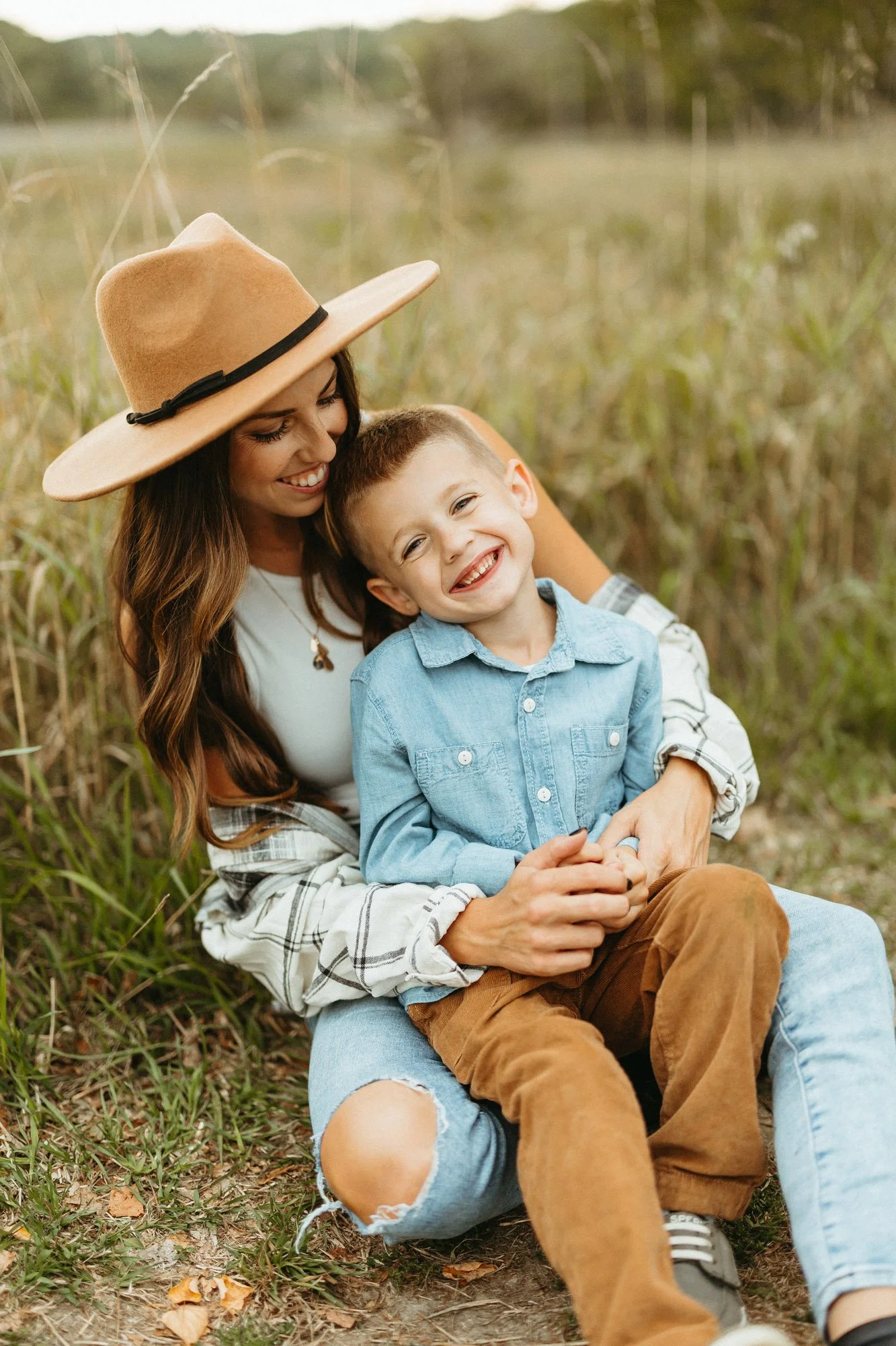mom-sitting-with-young-son-in-lap-family-photographer-autumn-skye-phoenix-boston.jpg