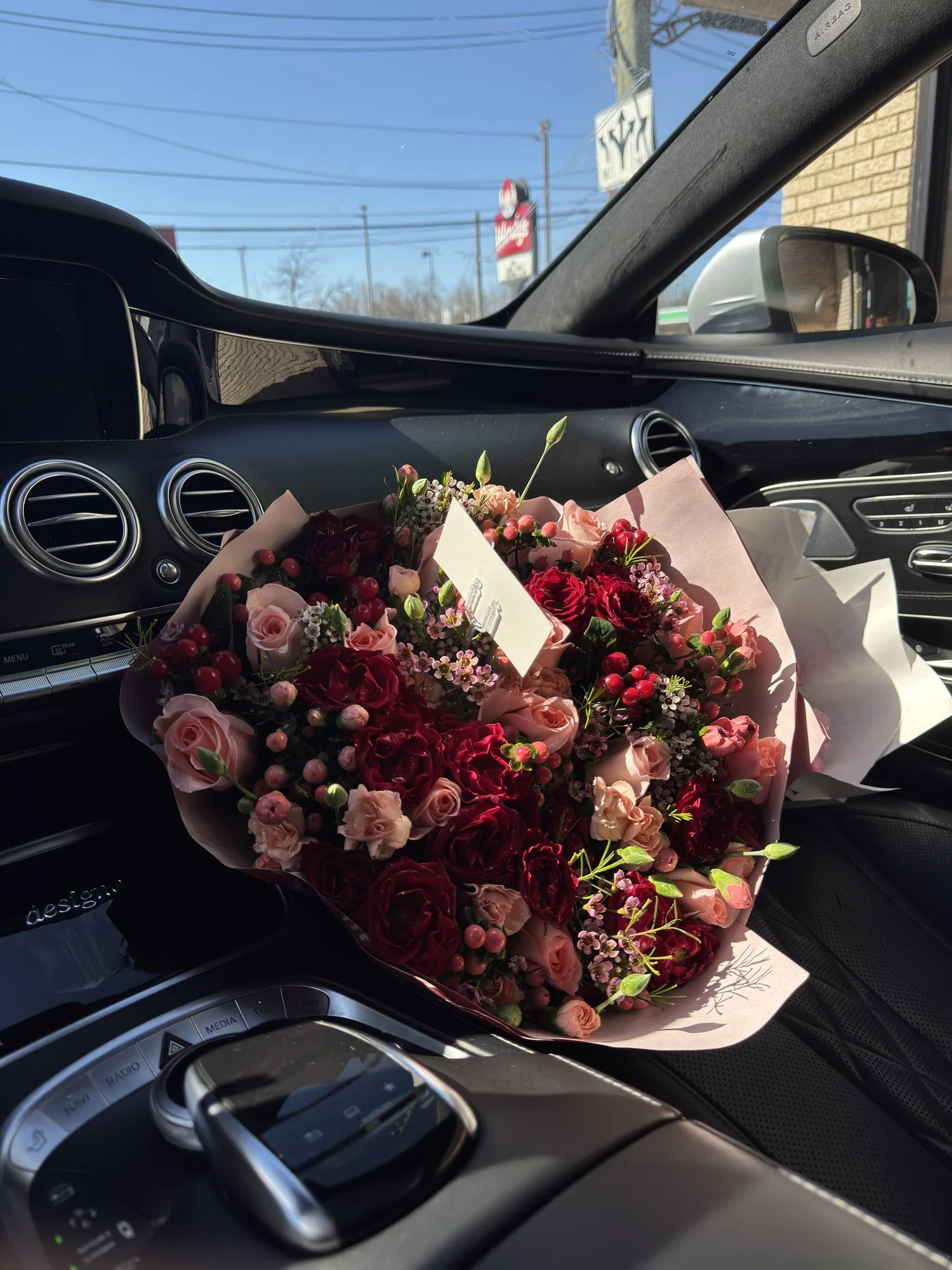 lovetoyourstep-mixed-flower-bouquet-car-interior.jpg