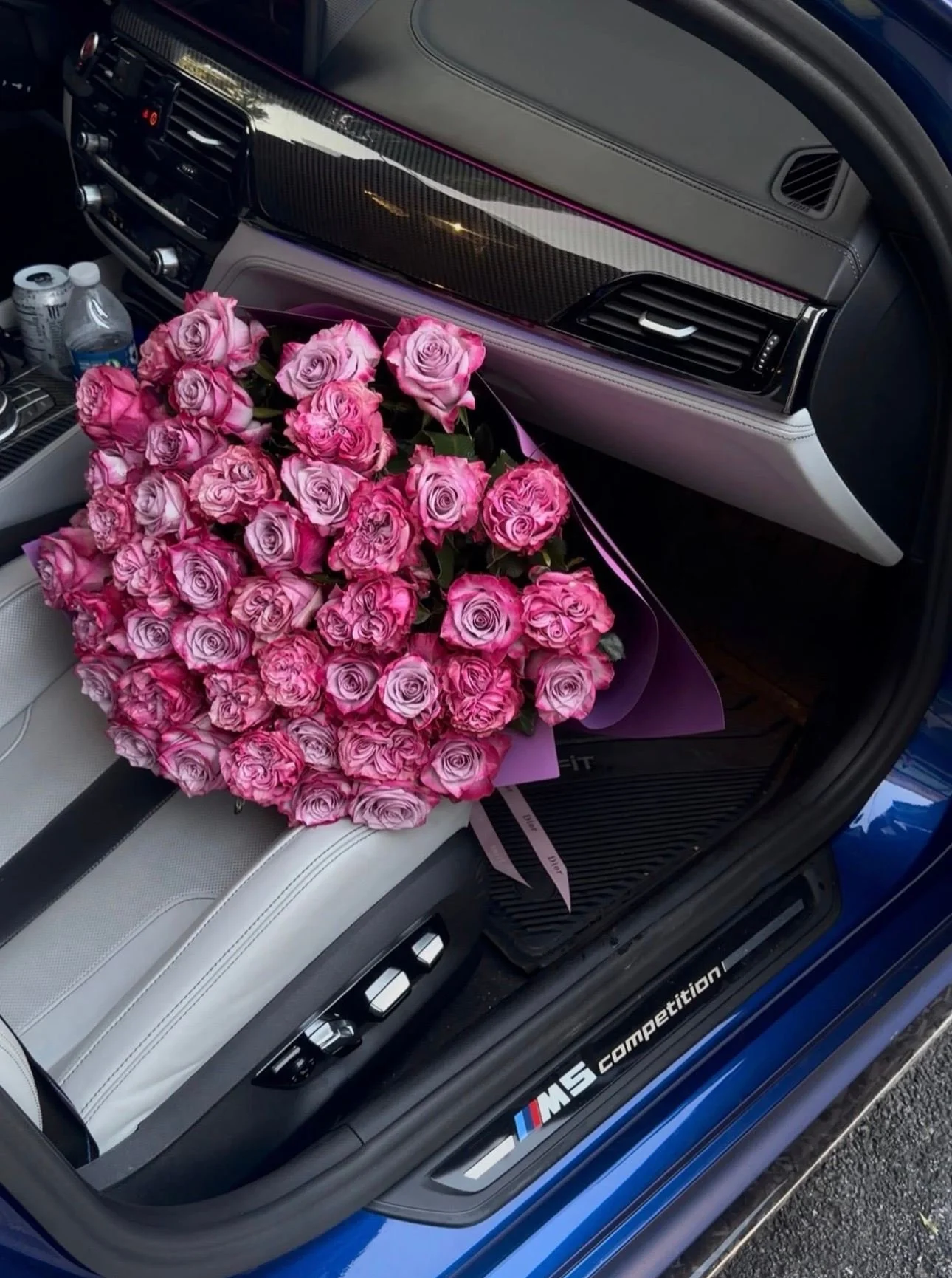 lovetoyourstep-pink-rose-bouquet-gray-passenger-seat.jpg