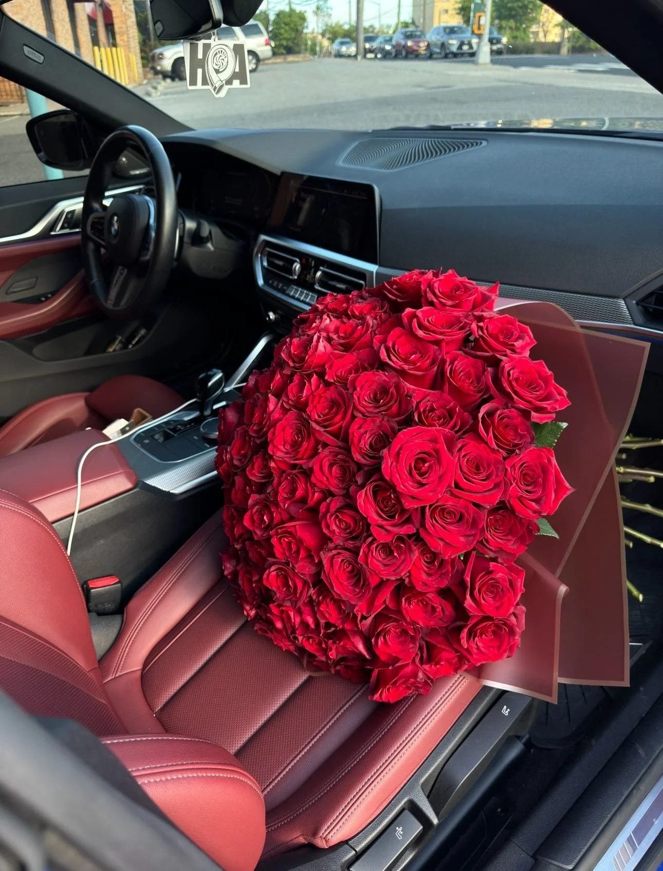 lovetoyourstep-red-rose-bouquet-burgundy-car-interior.jpg