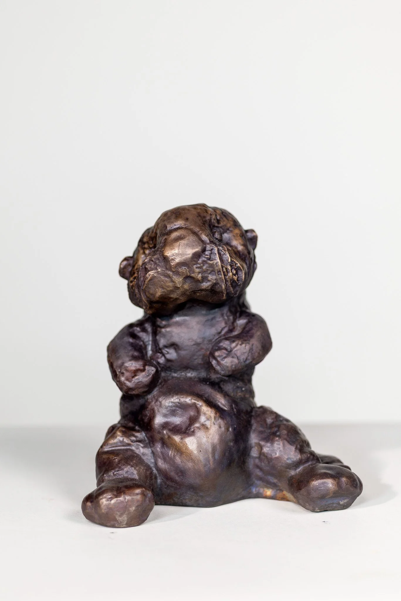 cast bronze otter plush