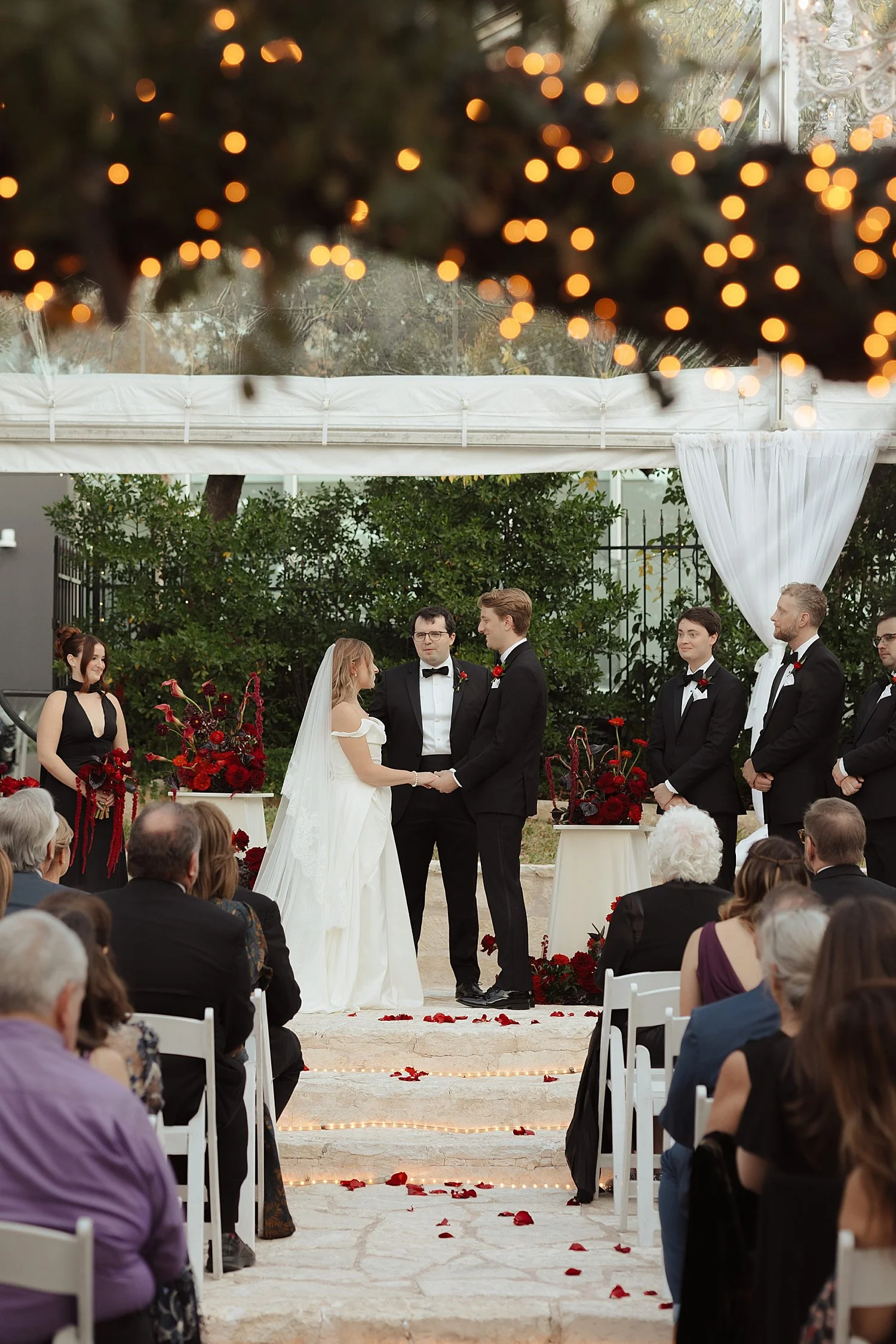  couple says i do in small ceremony on the lawn of The Allan House 