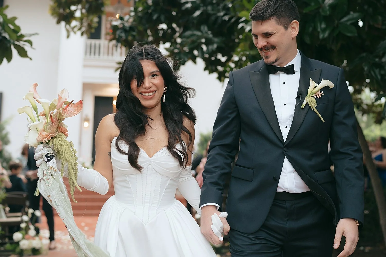  bride laughs as they walk back down the aisle after saying I Do by Jessica Joseph Photography 