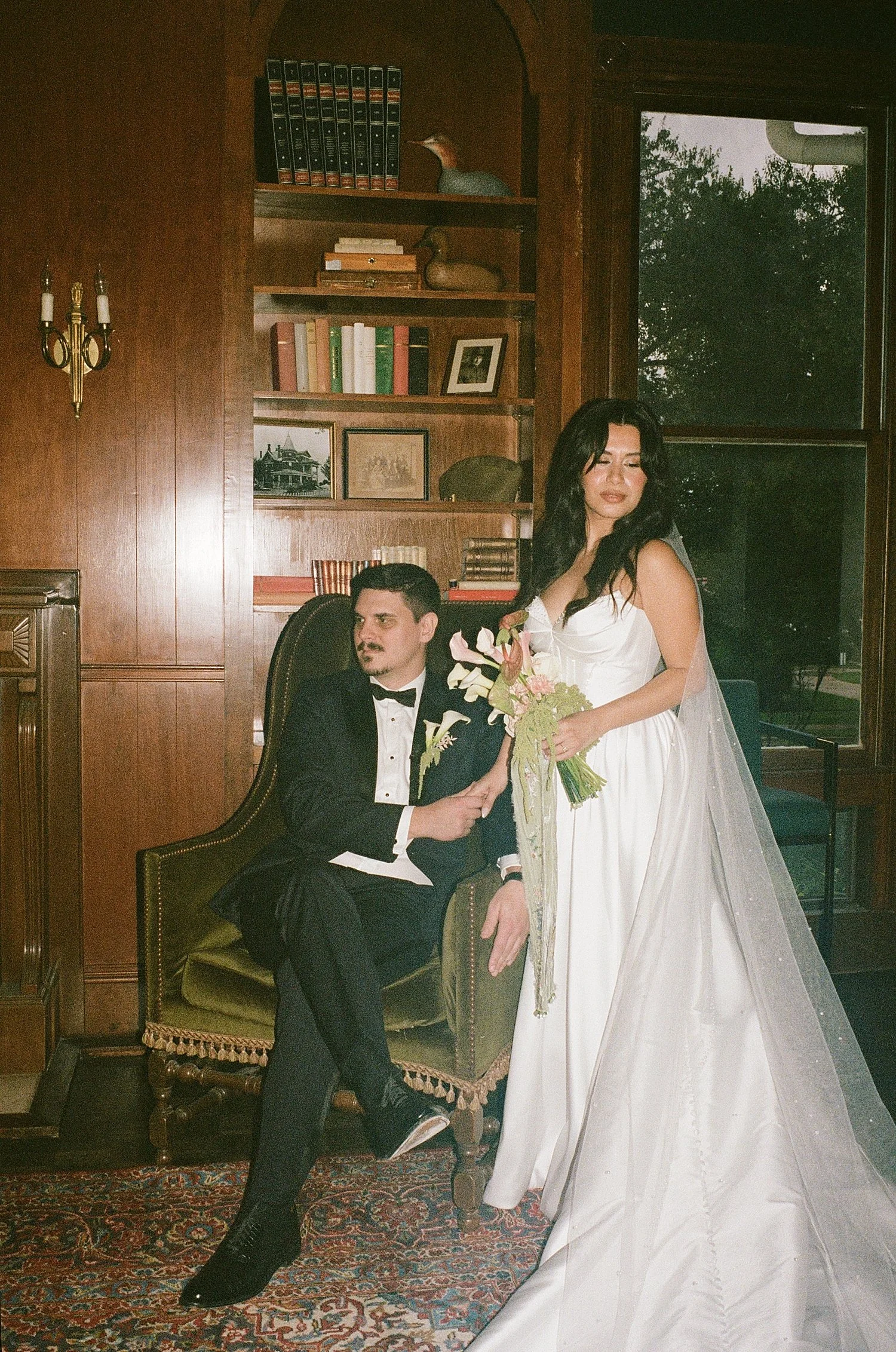  new husband and wife in old school library at Woodbine Mansion 