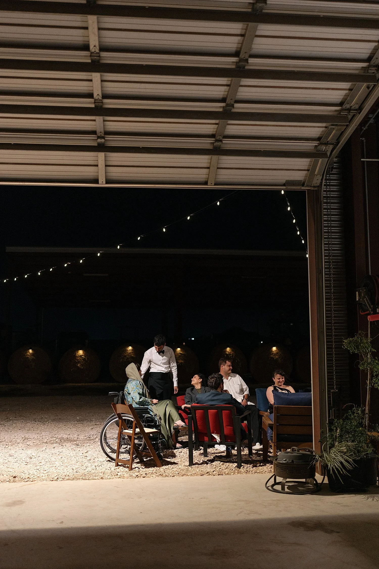  guest mingle in open concept barn by Jessica Joseph Photography 