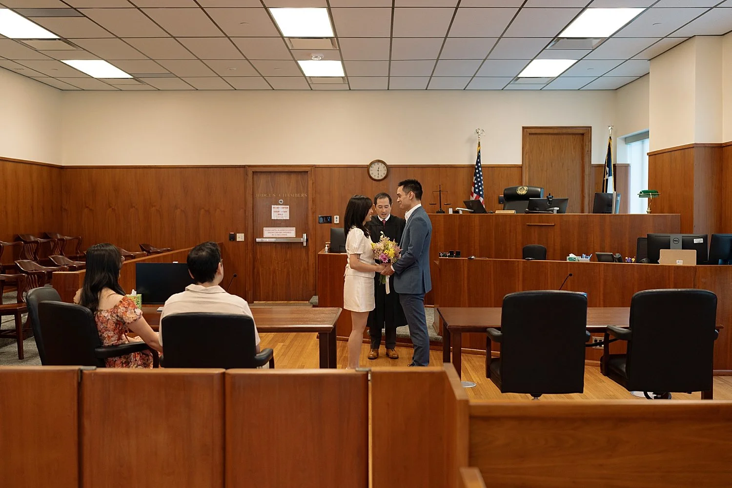  couple exchange their vows in front of judge by Texas wedding photographer 