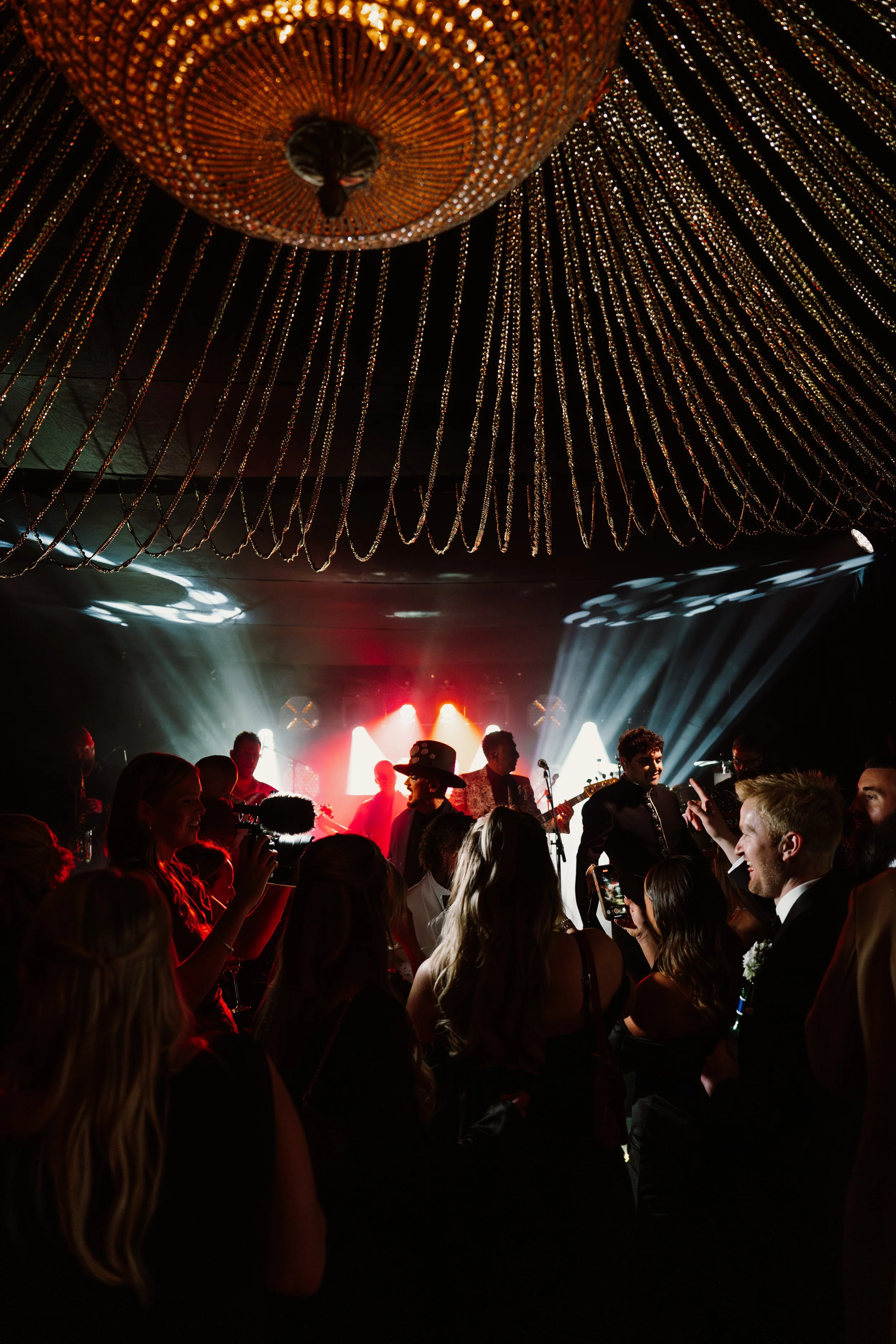 Boy George performing at Cotwolds wedding venue Euridge Manor. At a UK luxury wedding to a crowd of people.